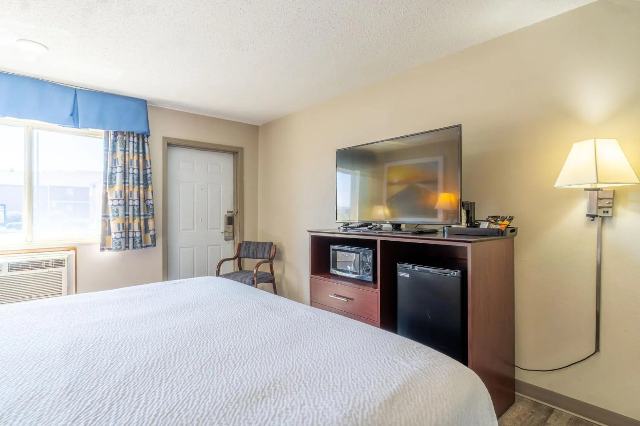 Bed in Days Inn by Wyndham Sioux City