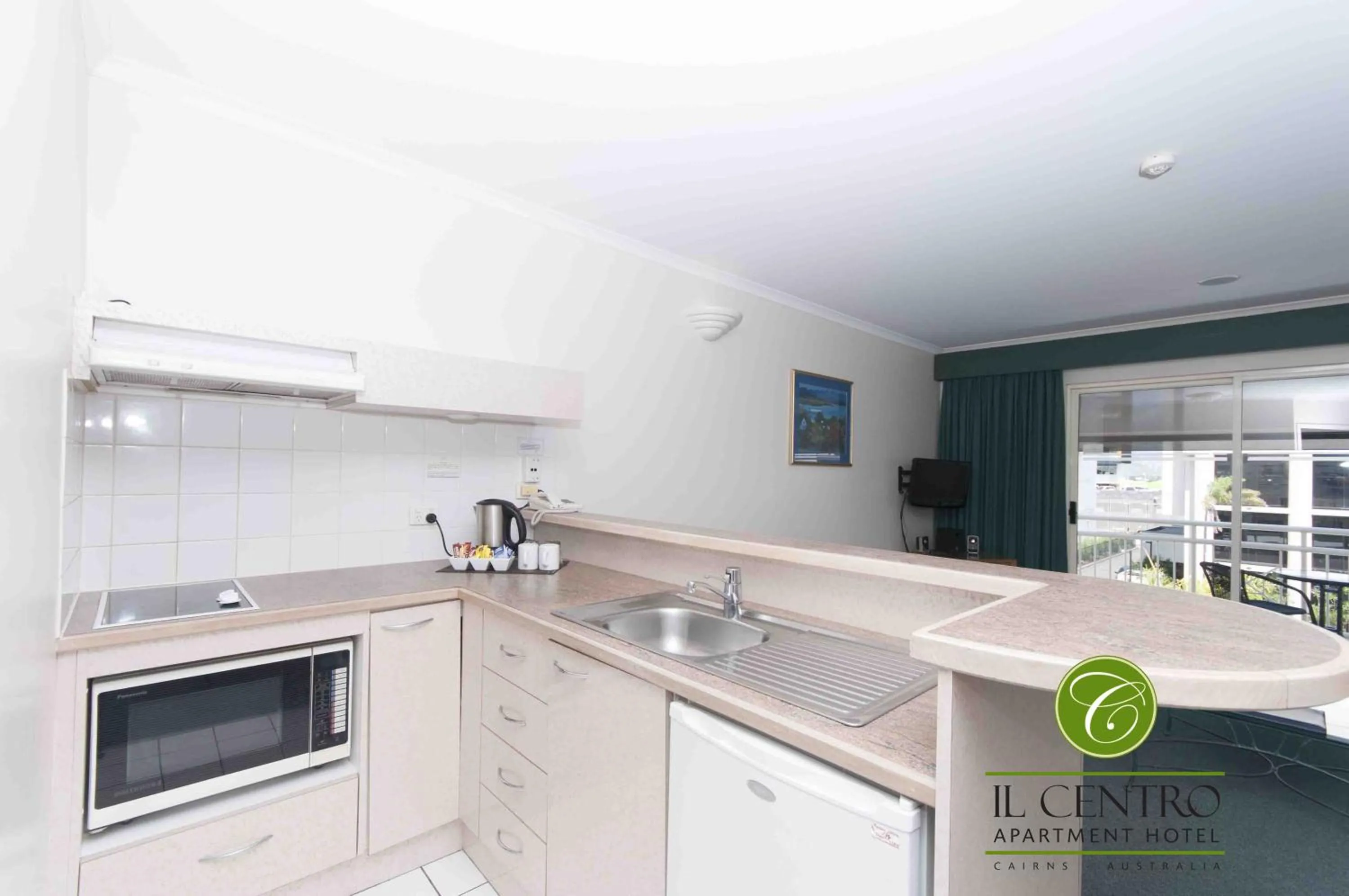 Kitchen or kitchenette in Il Centro Apartment Hotel
