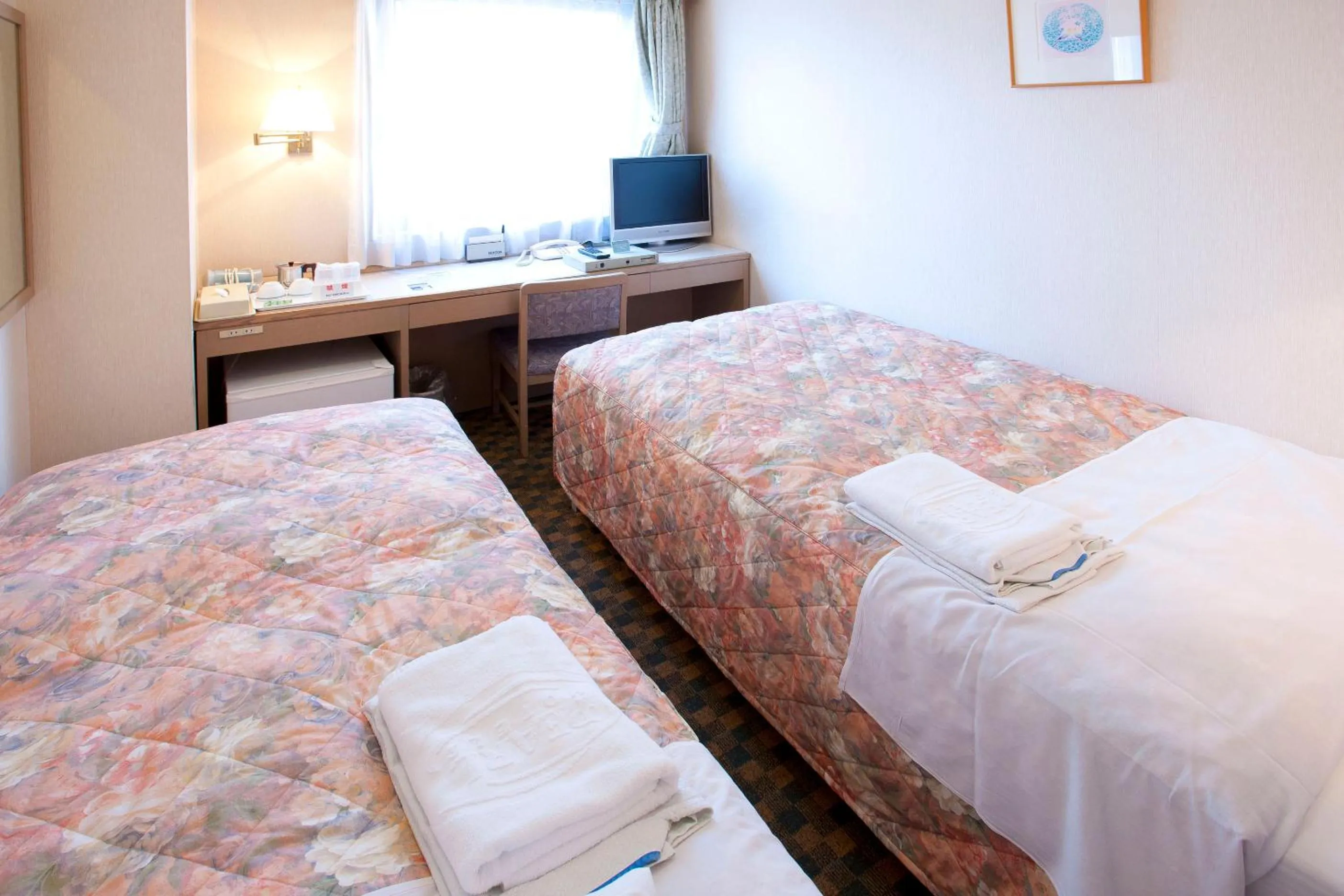 Photo of the whole room, TV/Entertainment Center in Pearl Hotel Kasai