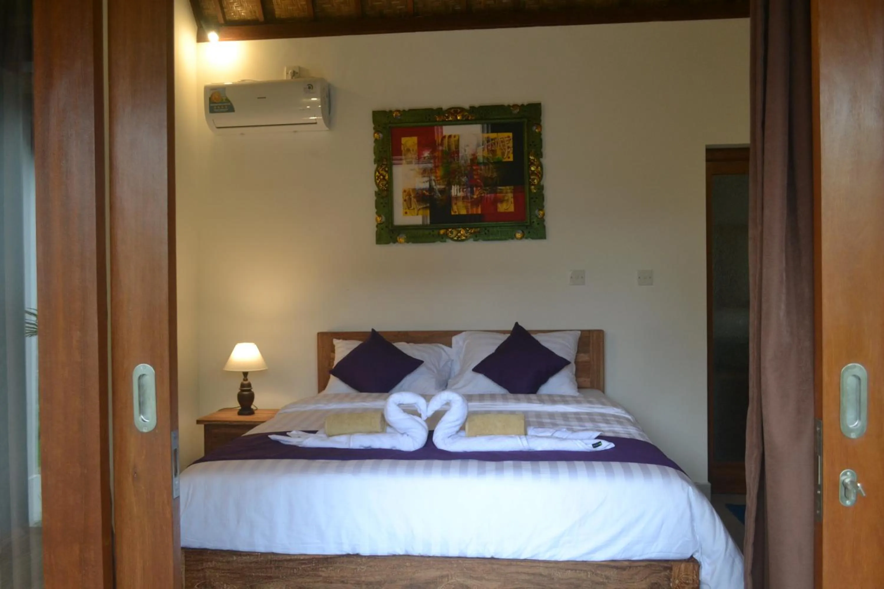 Bed in Buda Cottage Ubud