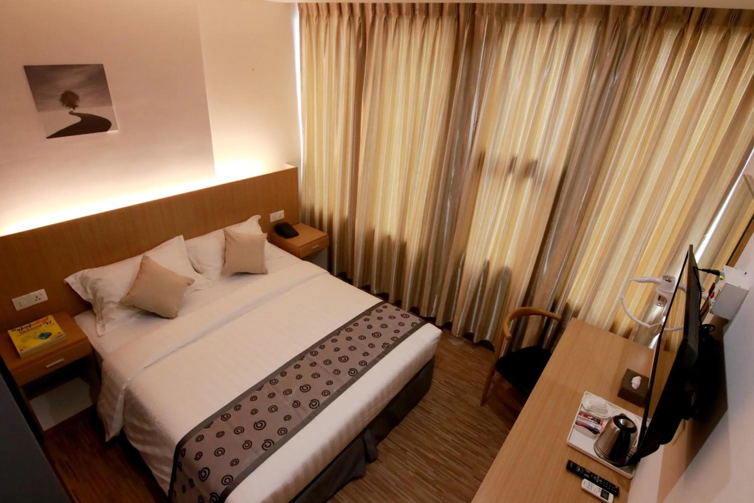 Bedroom in Botahtaung Hotel