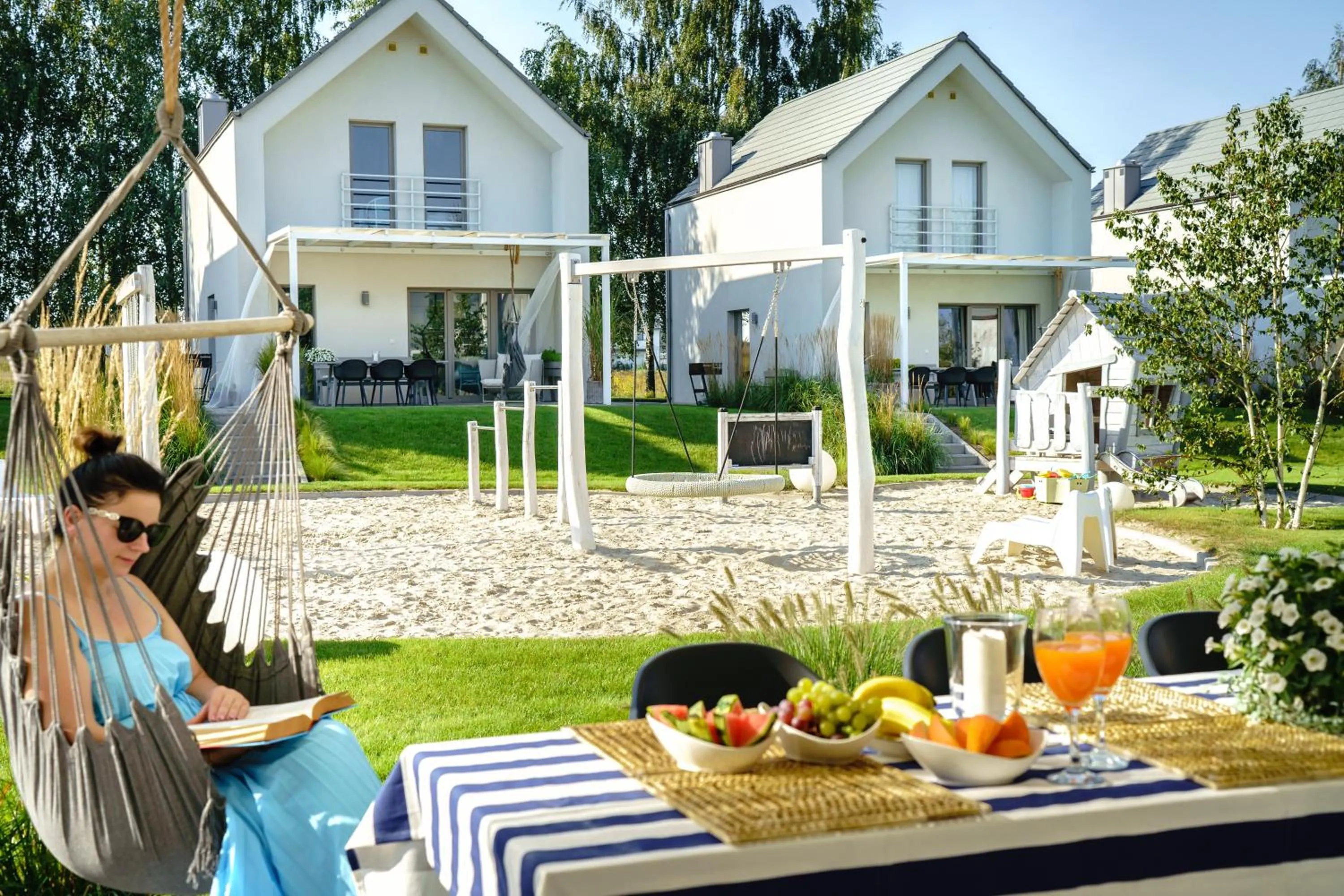 Garden in KOMFORTOWE DOMKI Brzozowa Przystań nad morzem we Władysławowie