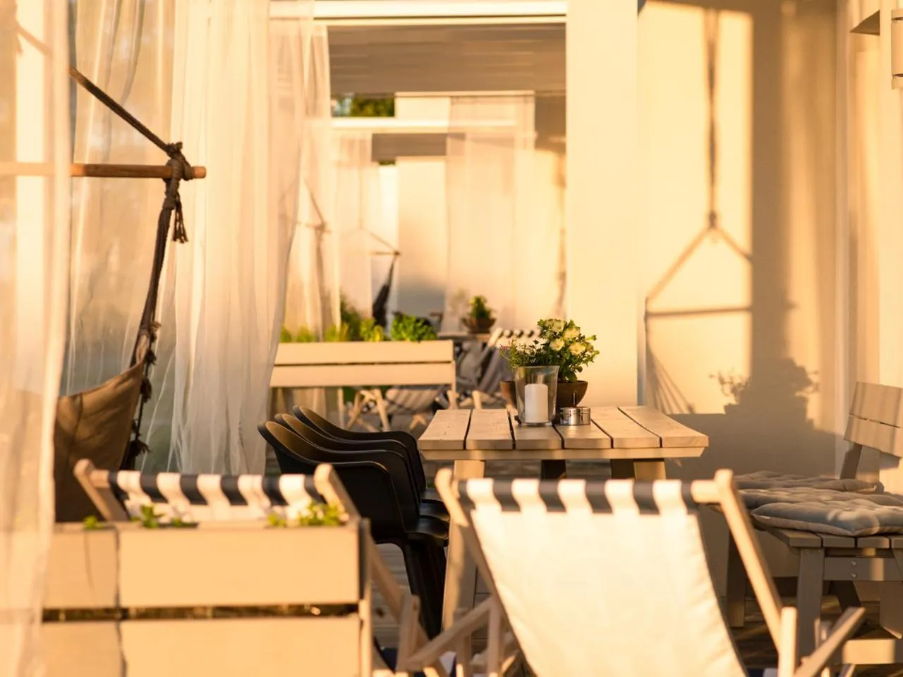 Seating area in KOMFORTOWE DOMKI Brzozowa Przystań nad morzem we Władysławowie