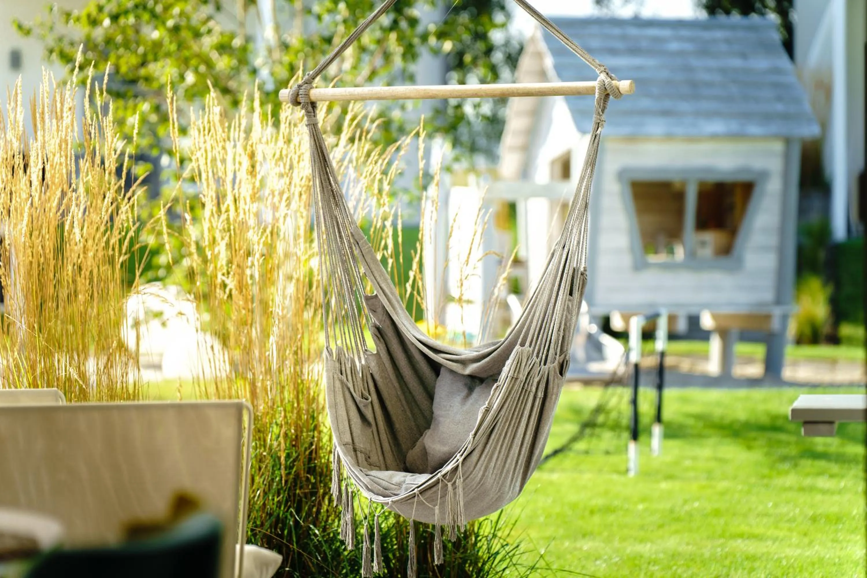 Garden view in KOMFORTOWE DOMKI Brzozowa Przystań nad morzem we Władysławowie