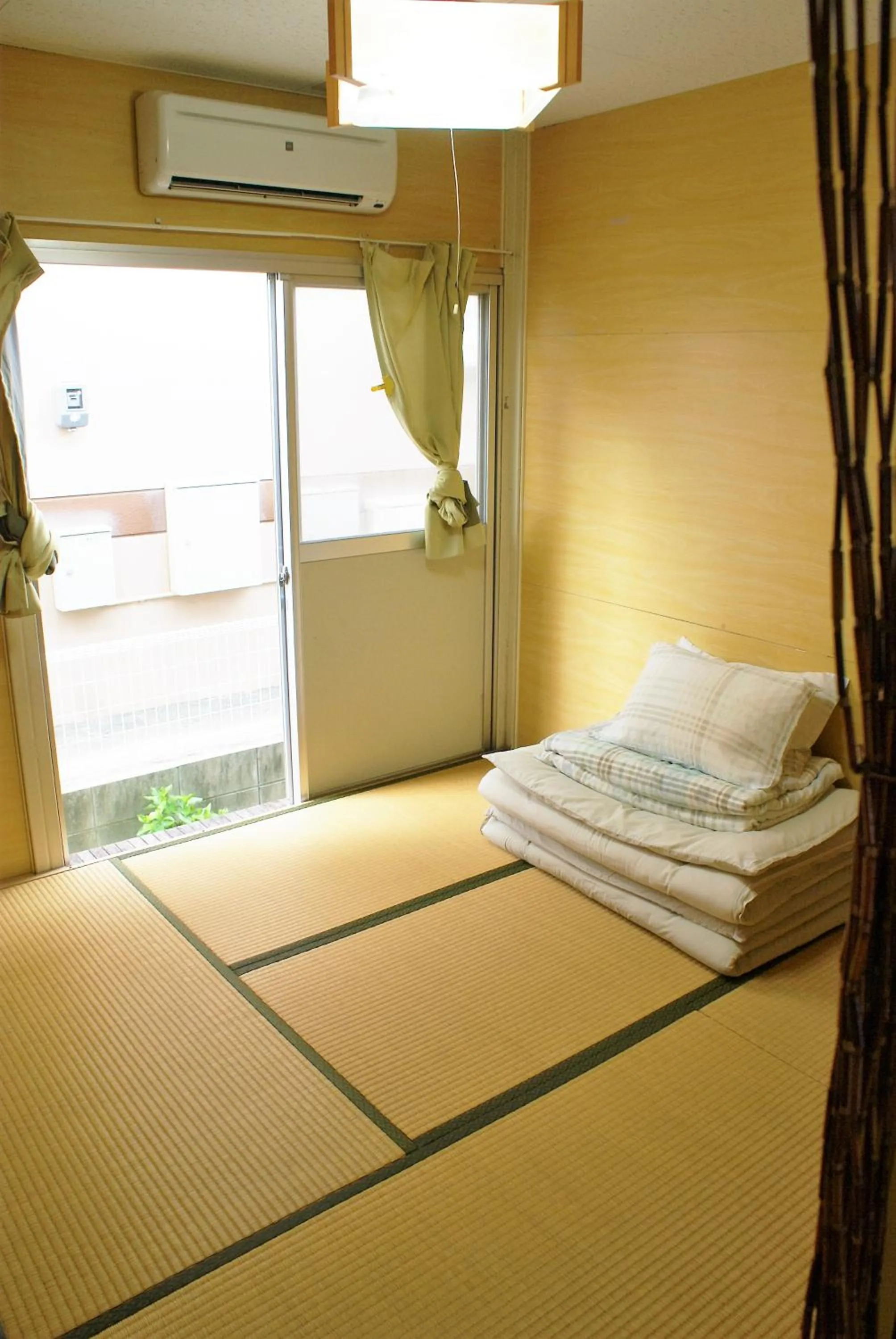 Photo of the whole room, Bed in Minshuku Agaihama