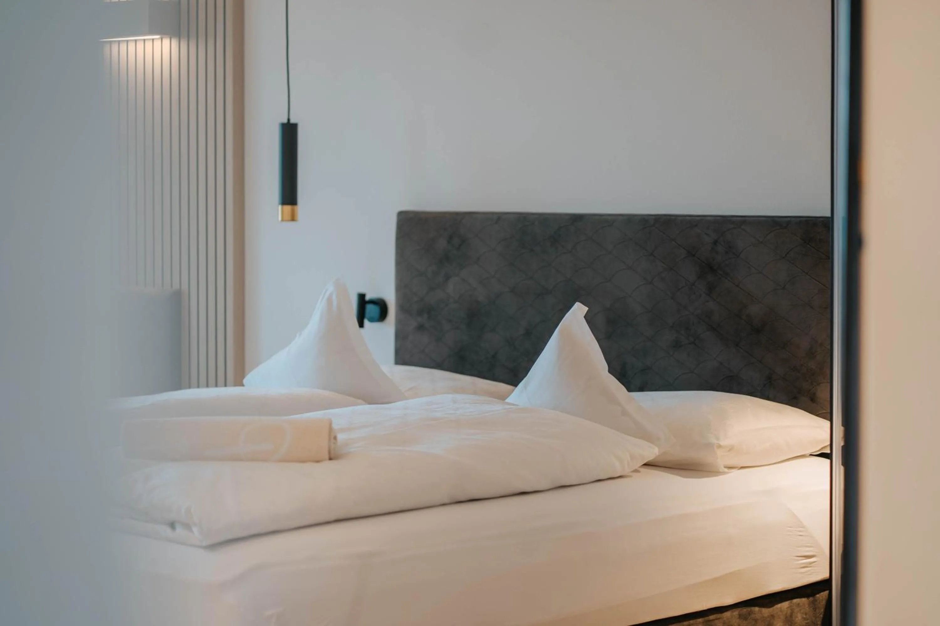 Bed in Small Hotel Sonne