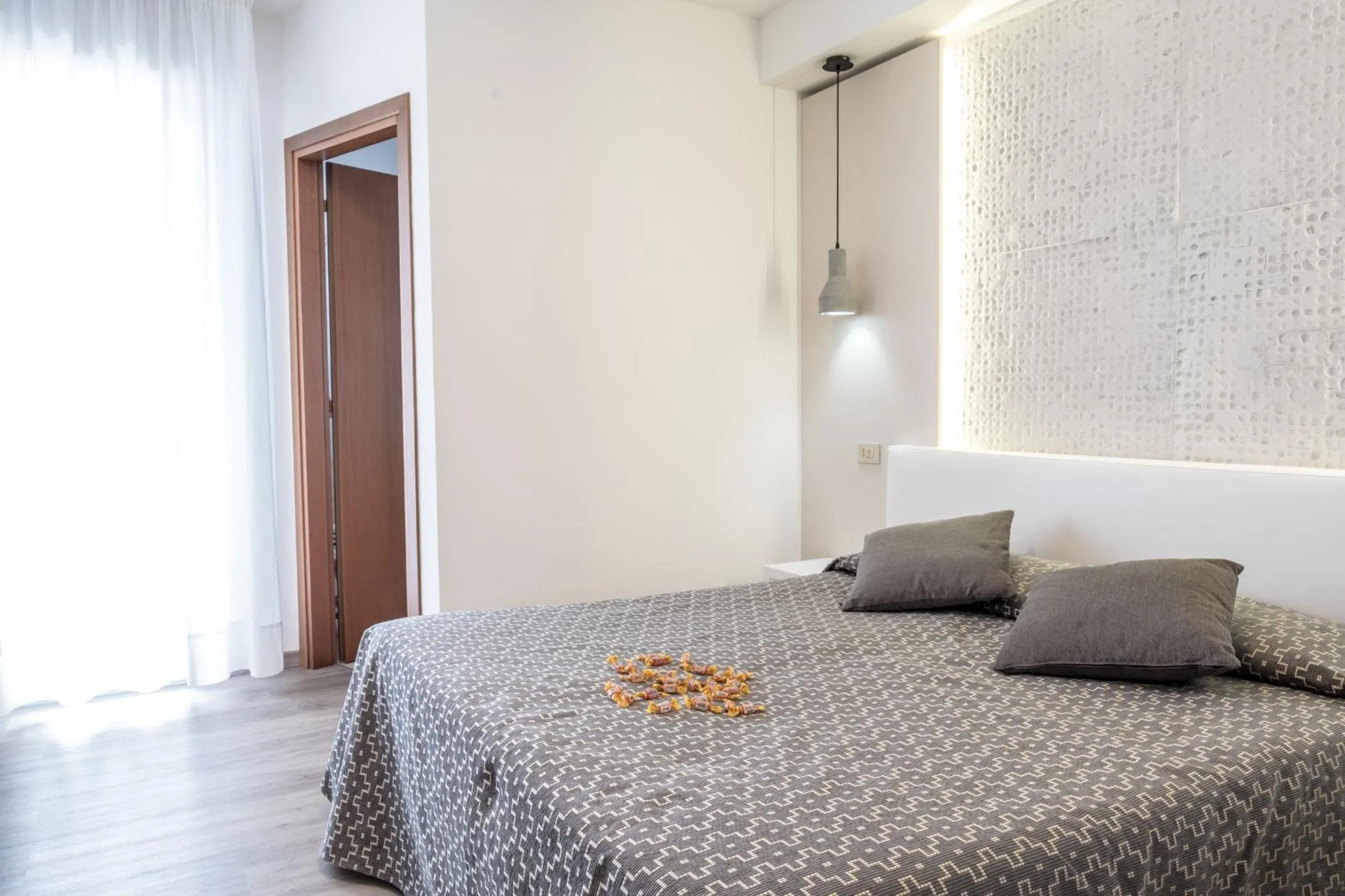 Bed in Hotel Nettuno