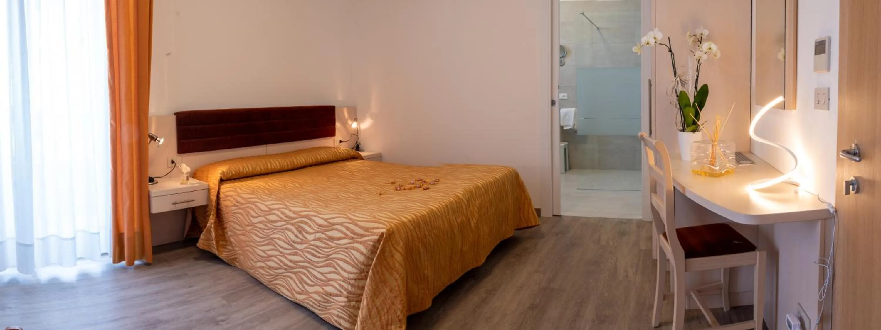 Bed in Hotel Nettuno