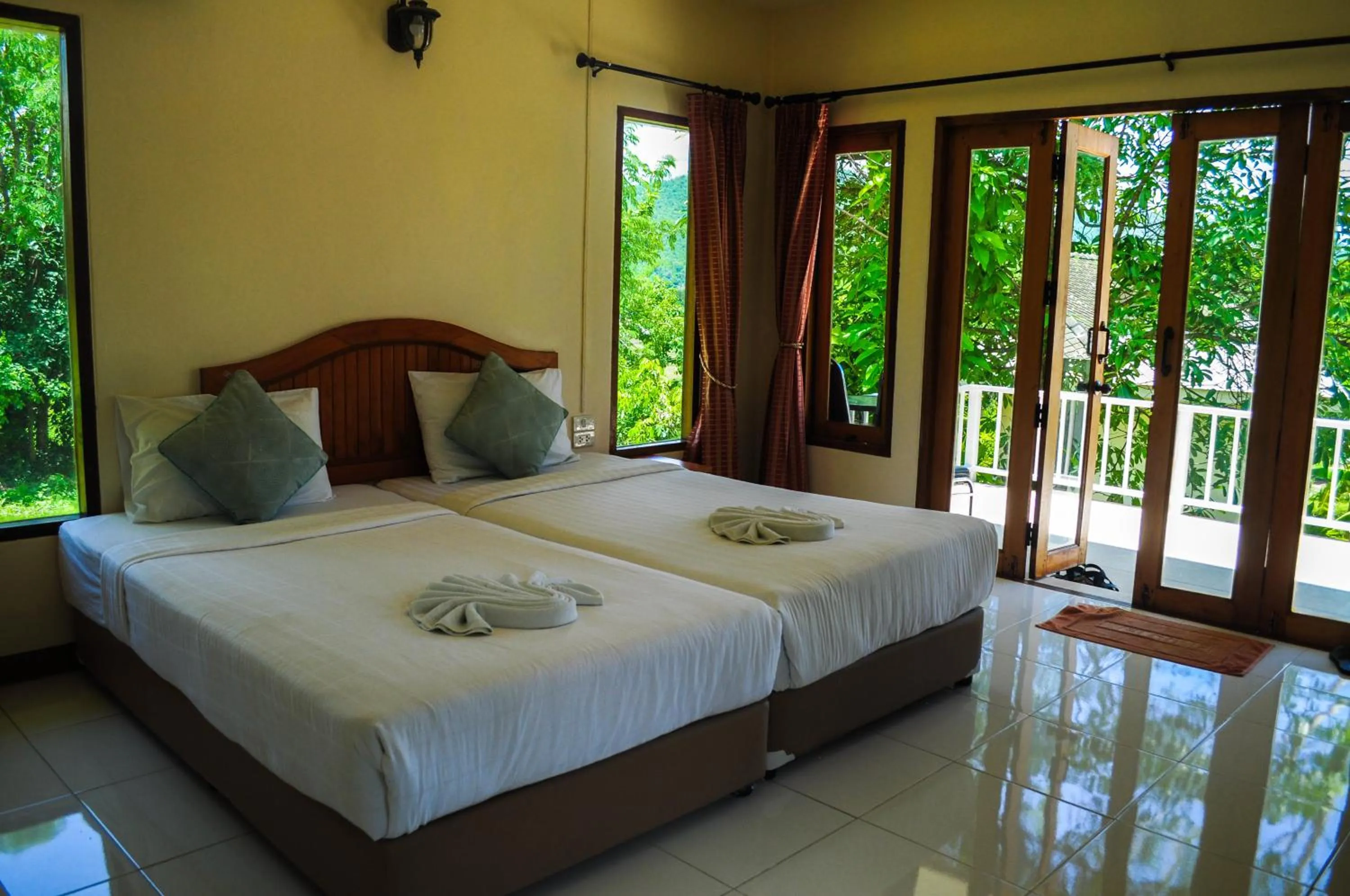 Bed in Pai Iyara Resort