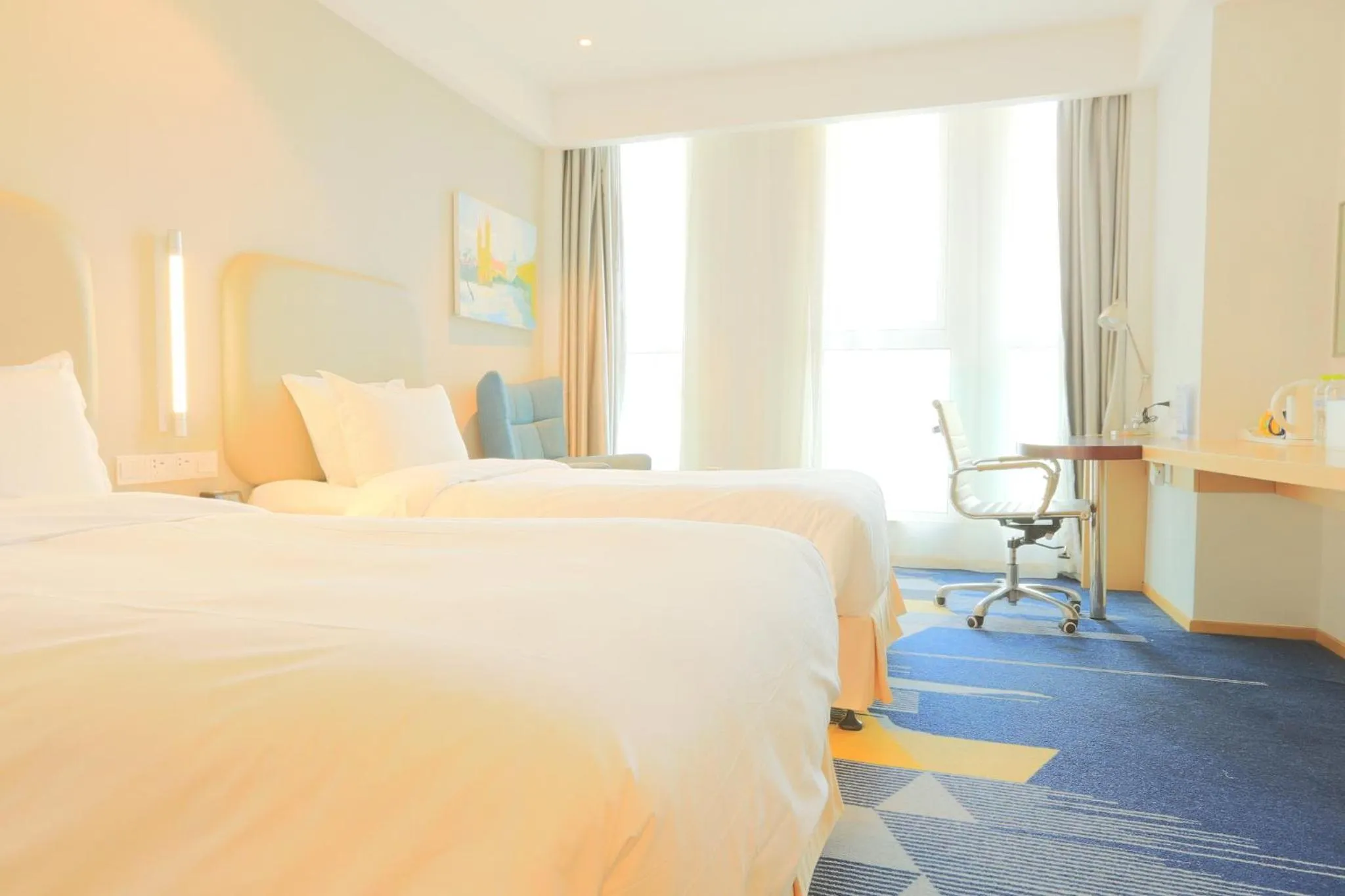 Photo of the whole room, Bed in Holiday Inn Express - Qingdao West Coast by IHG
