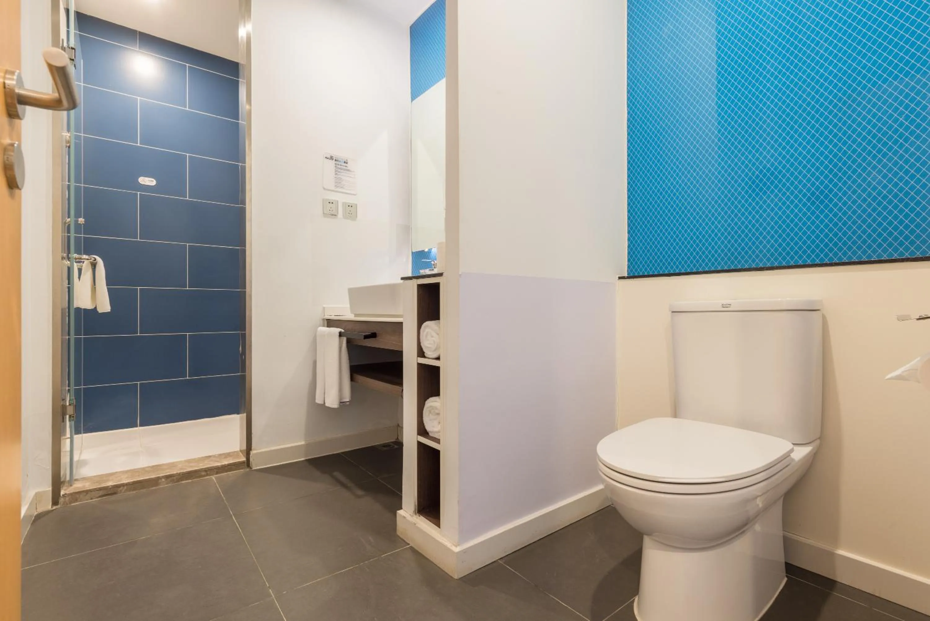 Bathroom in Holiday Inn Express - Wuhan Optical Valley by IHG