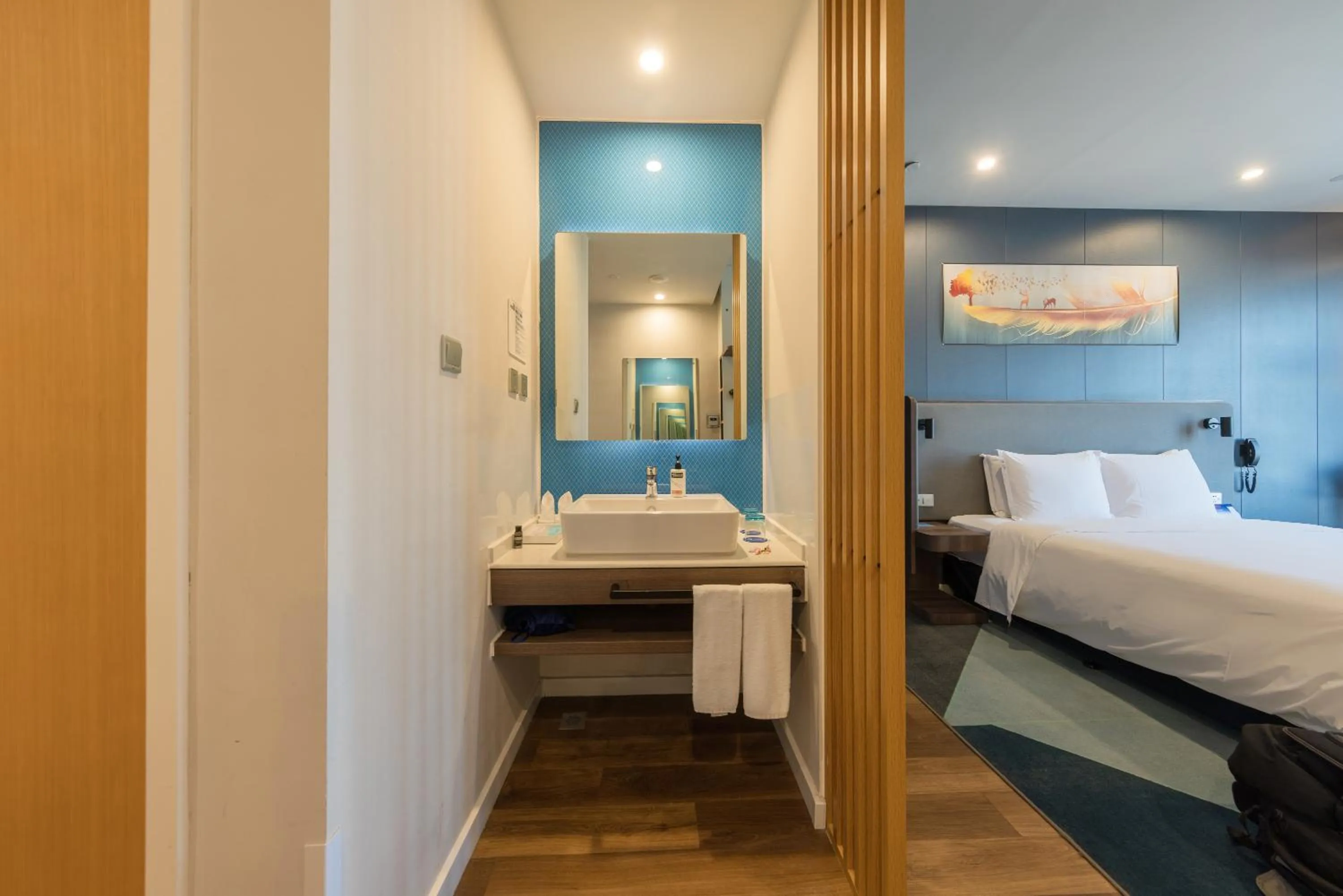 towels, Bed in Holiday Inn Express - Wuhan Optical Valley by IHG