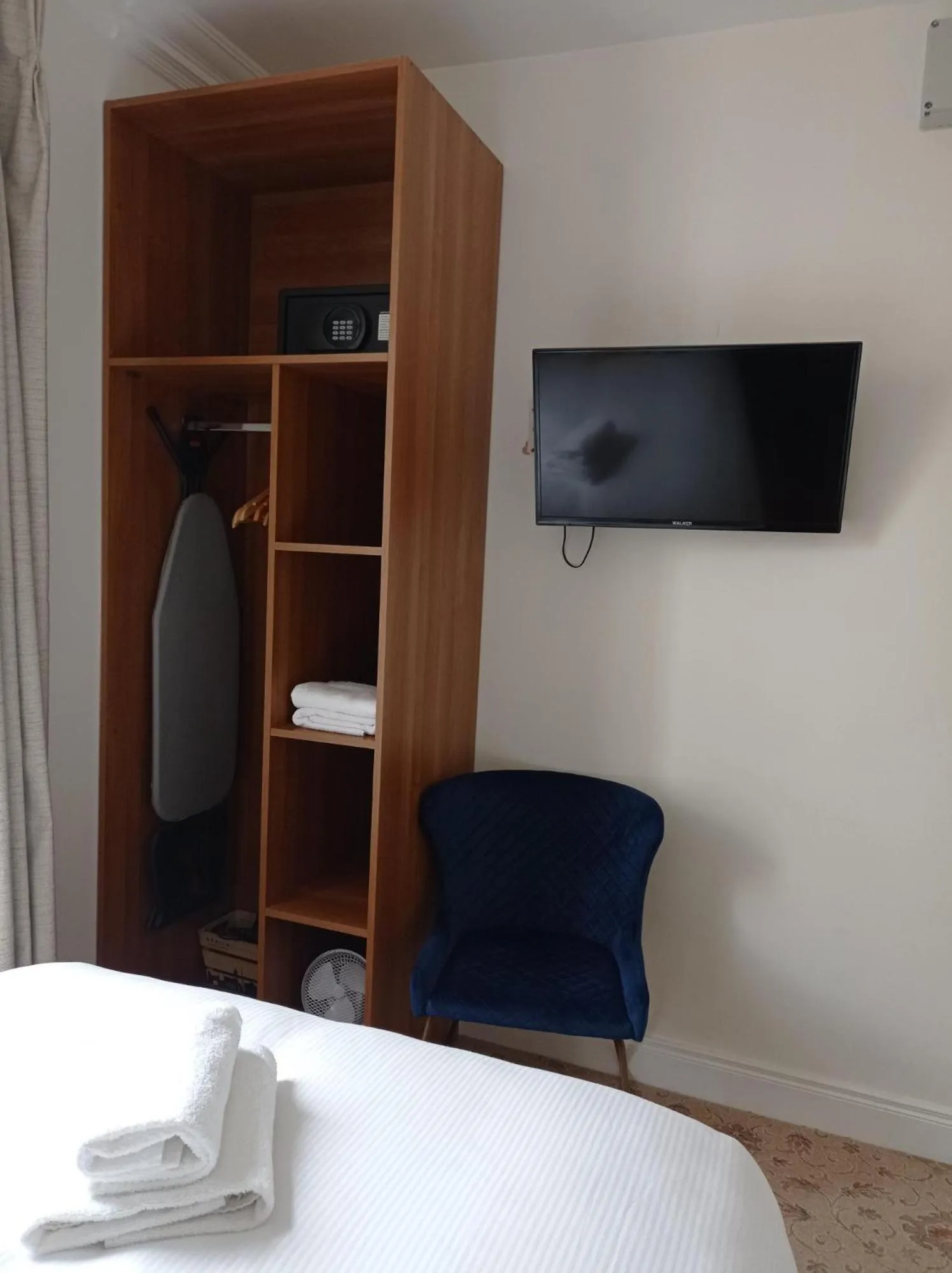 Bed in Tom Dick and Harriet's Accommodation