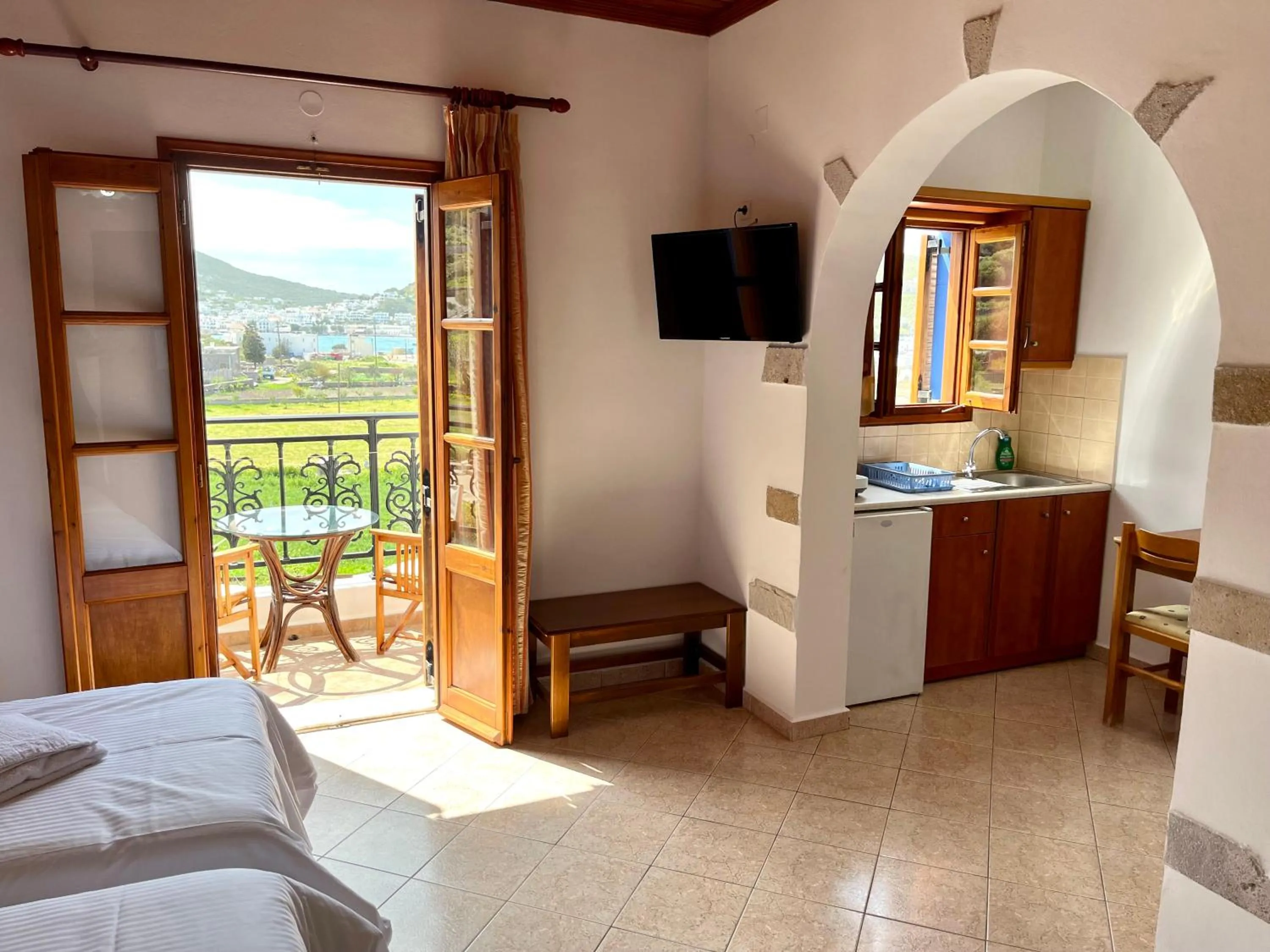 Photo of the whole room, Bed in Nicolas Studios