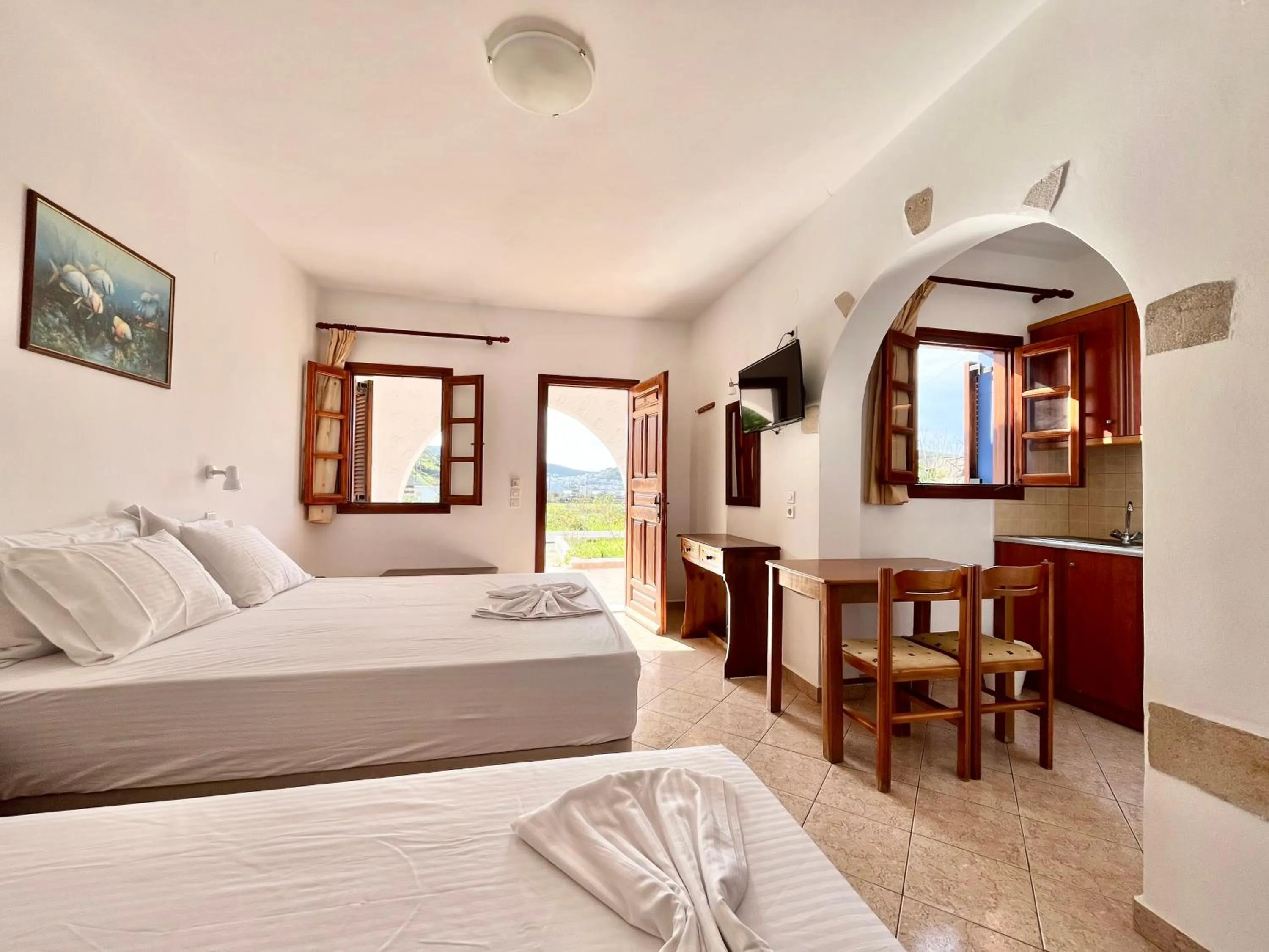 Photo of the whole room, Bed in Nicolas Studios