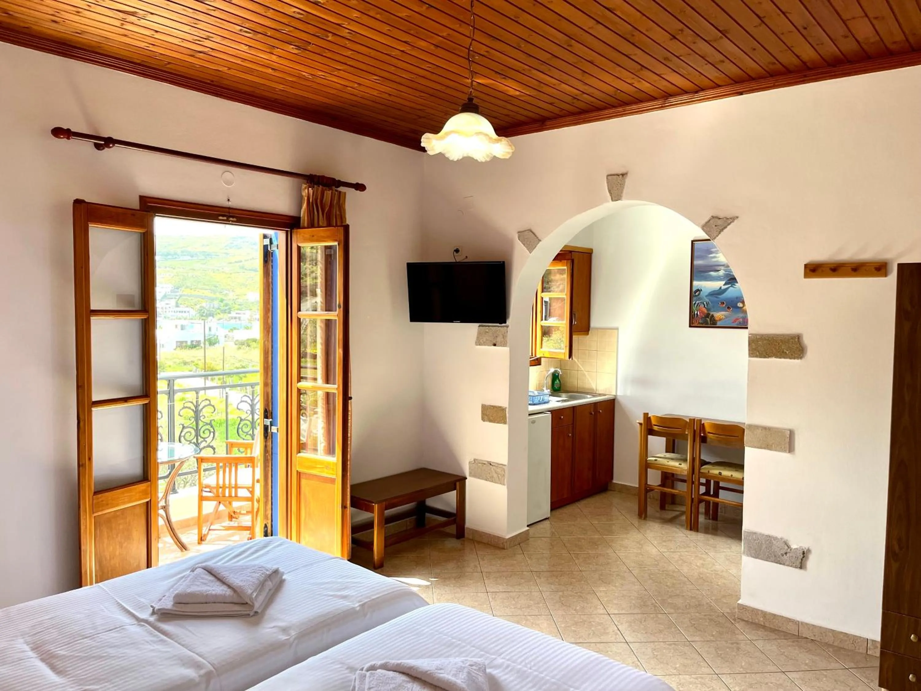 Photo of the whole room, Bed in Nicolas Studios