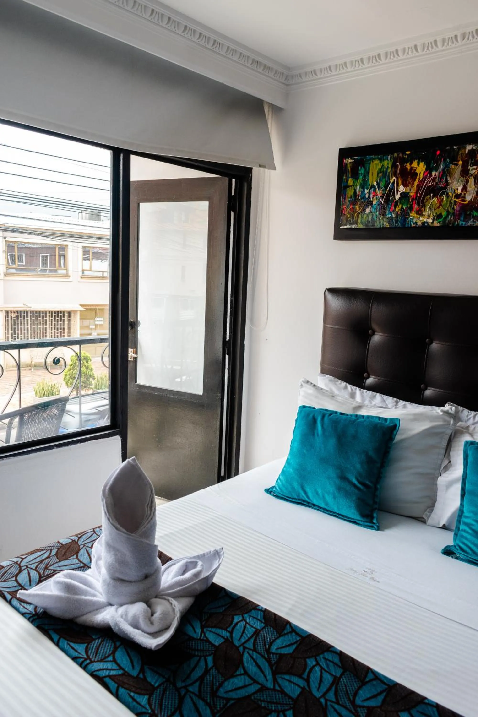 Photo of the whole room, Bed in Hotel Central House a 5 min de la Embajada Americana