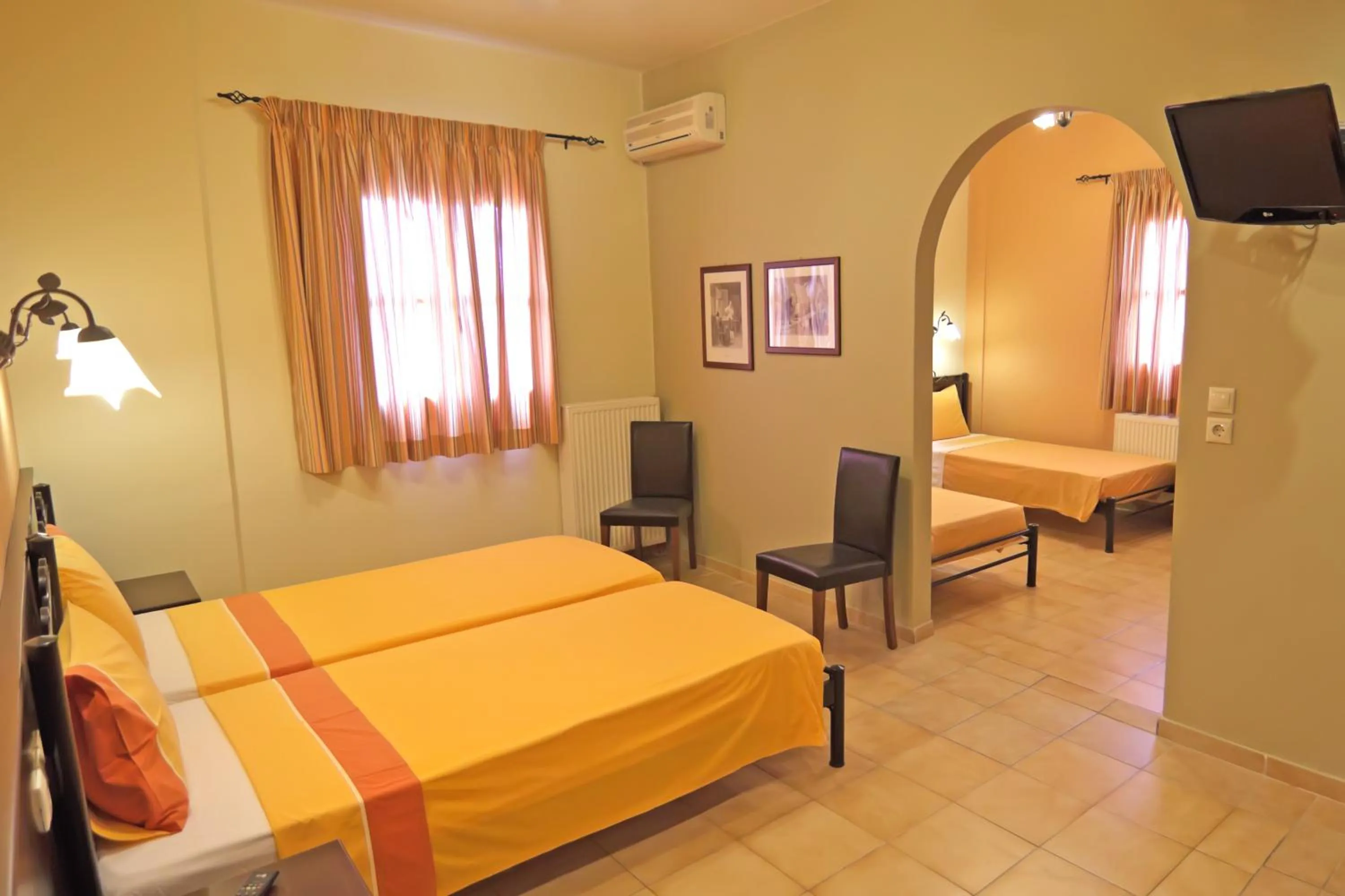 Photo of the whole room, Bed in Minos Pension