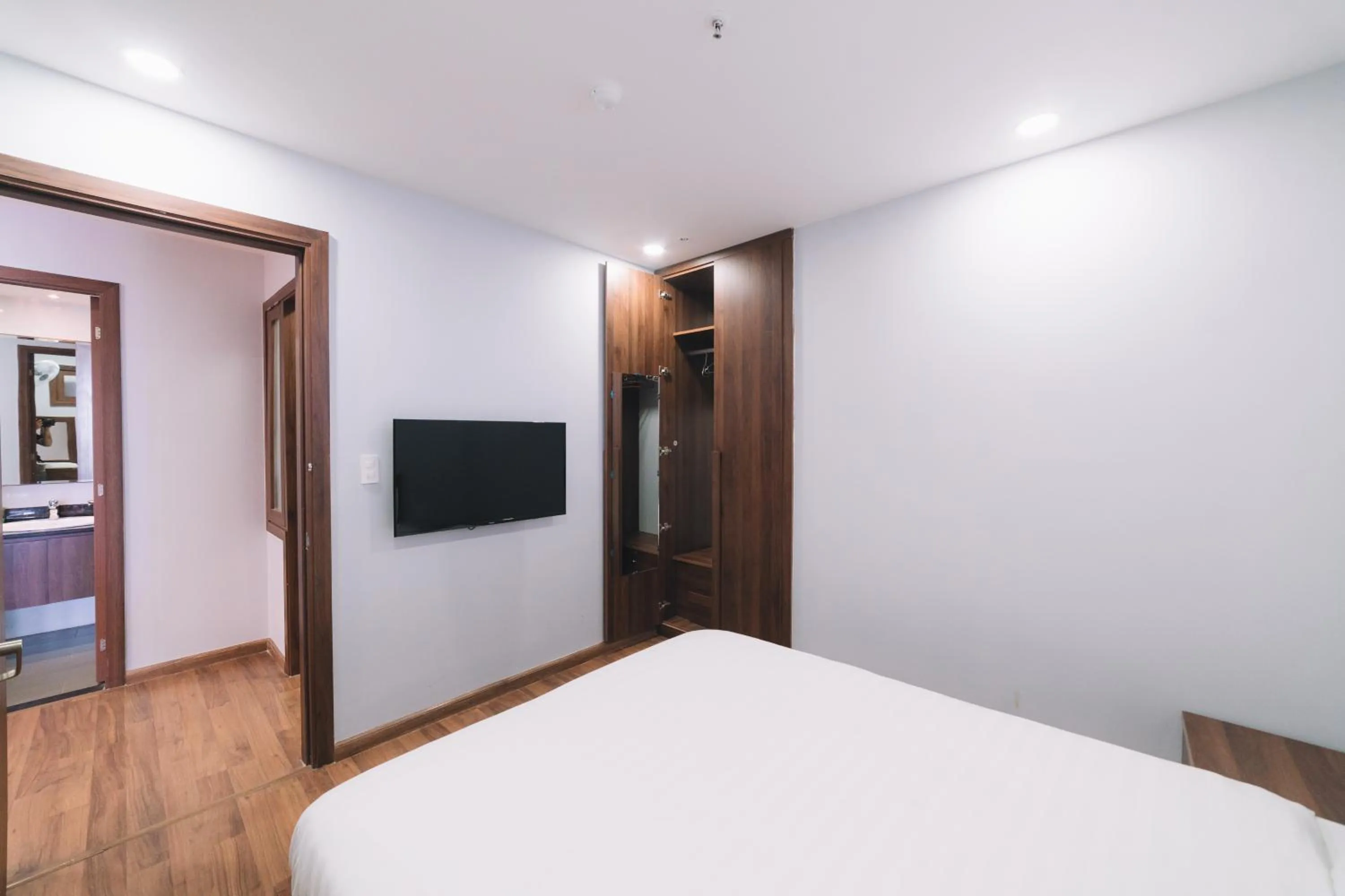 Communal lounge/ TV room, Bed in Dalat Center Residence
