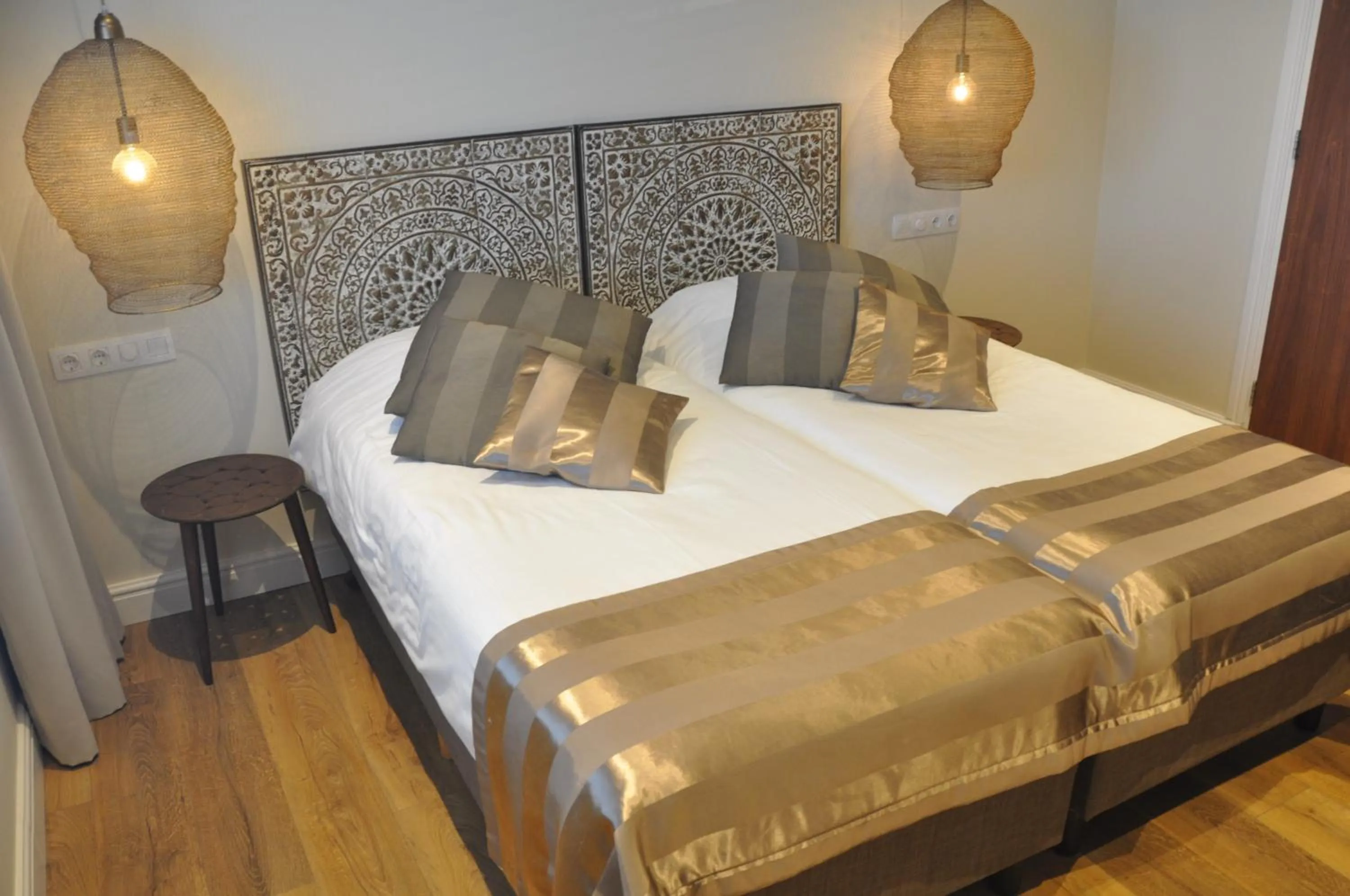 Bed in Hotel Sanders de Paauw