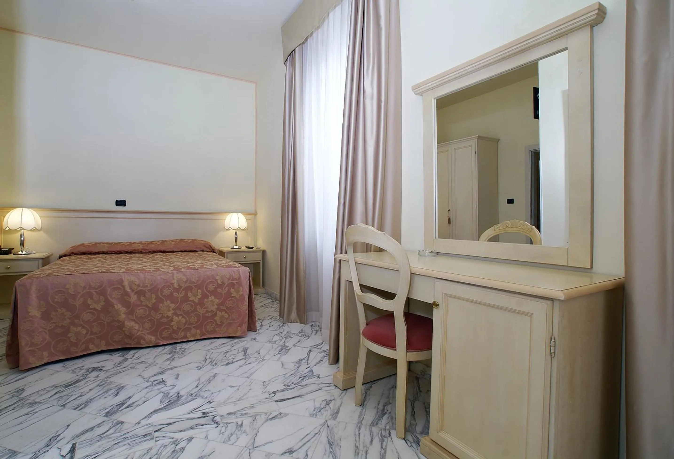 Bed in Hotel Coluccini