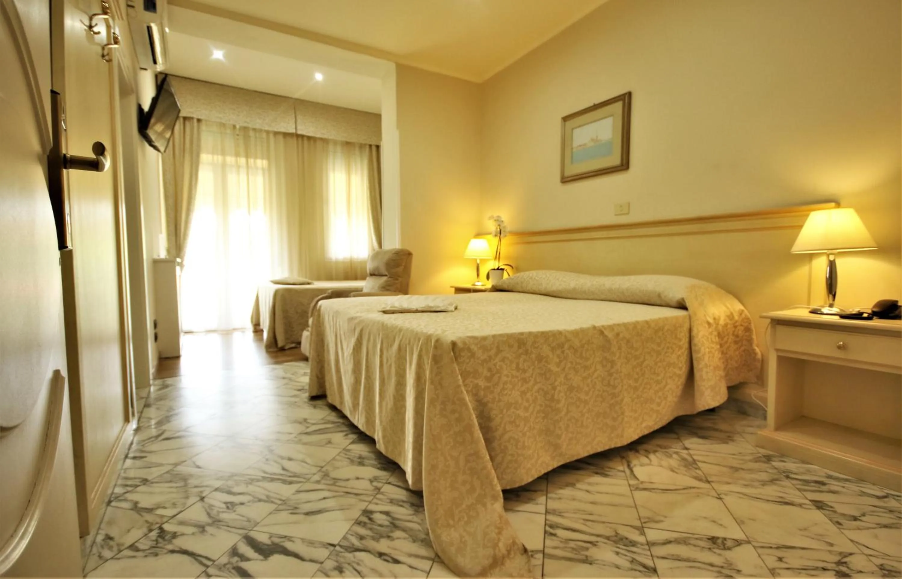 Bed in Hotel Coluccini