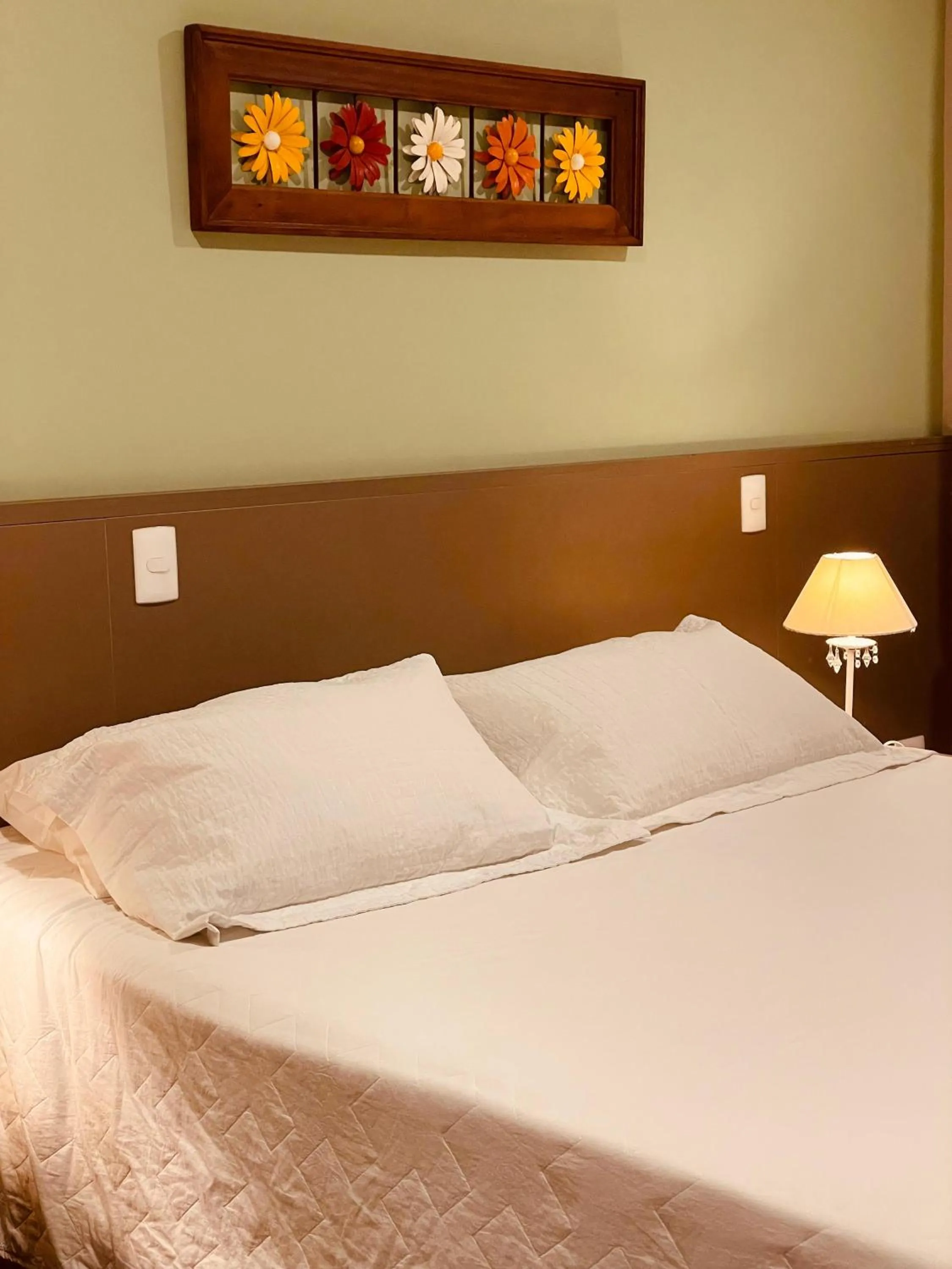 Bed in Pousada Cantinho da Serra