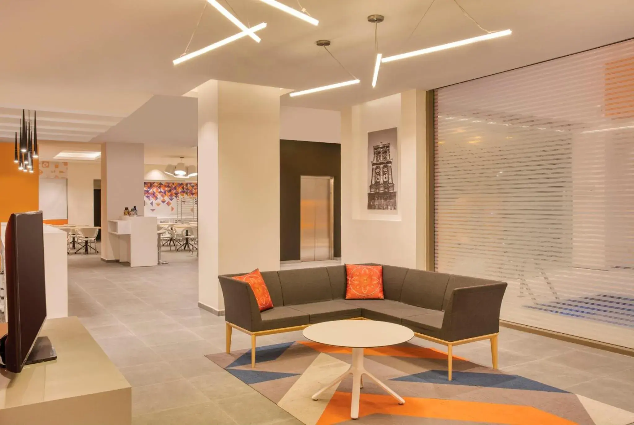 Living room in Fiesta Inn Express Puebla Explanada Living room in Fiesta Inn Express Puebla Explanada