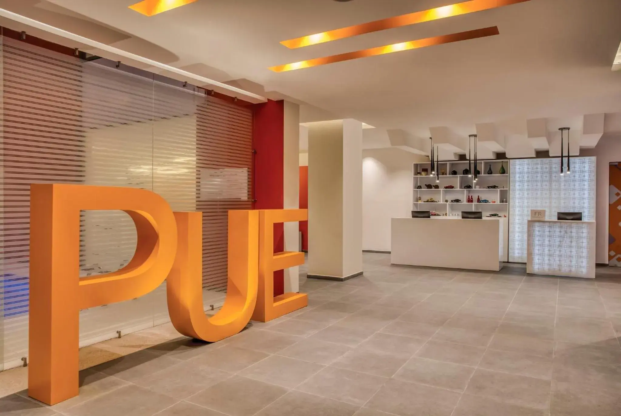 Living room in Fiesta Inn Express Puebla Explanada Living room in Fiesta Inn Express Puebla Explanada