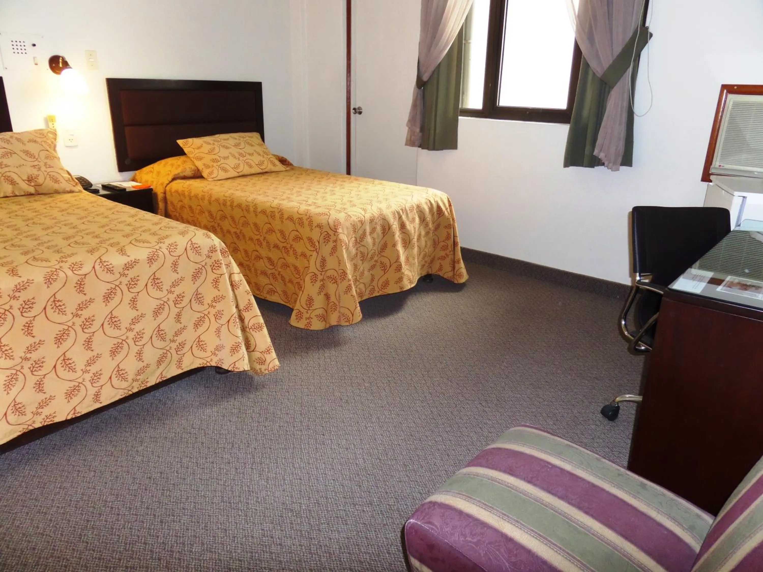 Photo of the whole room, Bed in Intiotel Chiclayo