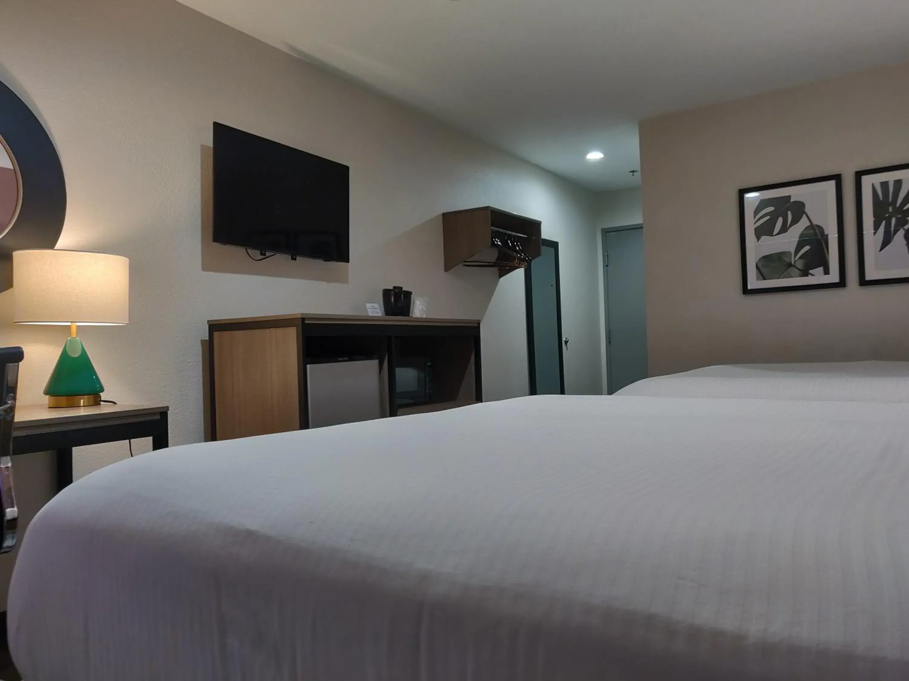 Bed in Arya Inn and Suites Bed in Arya Inn and Suites