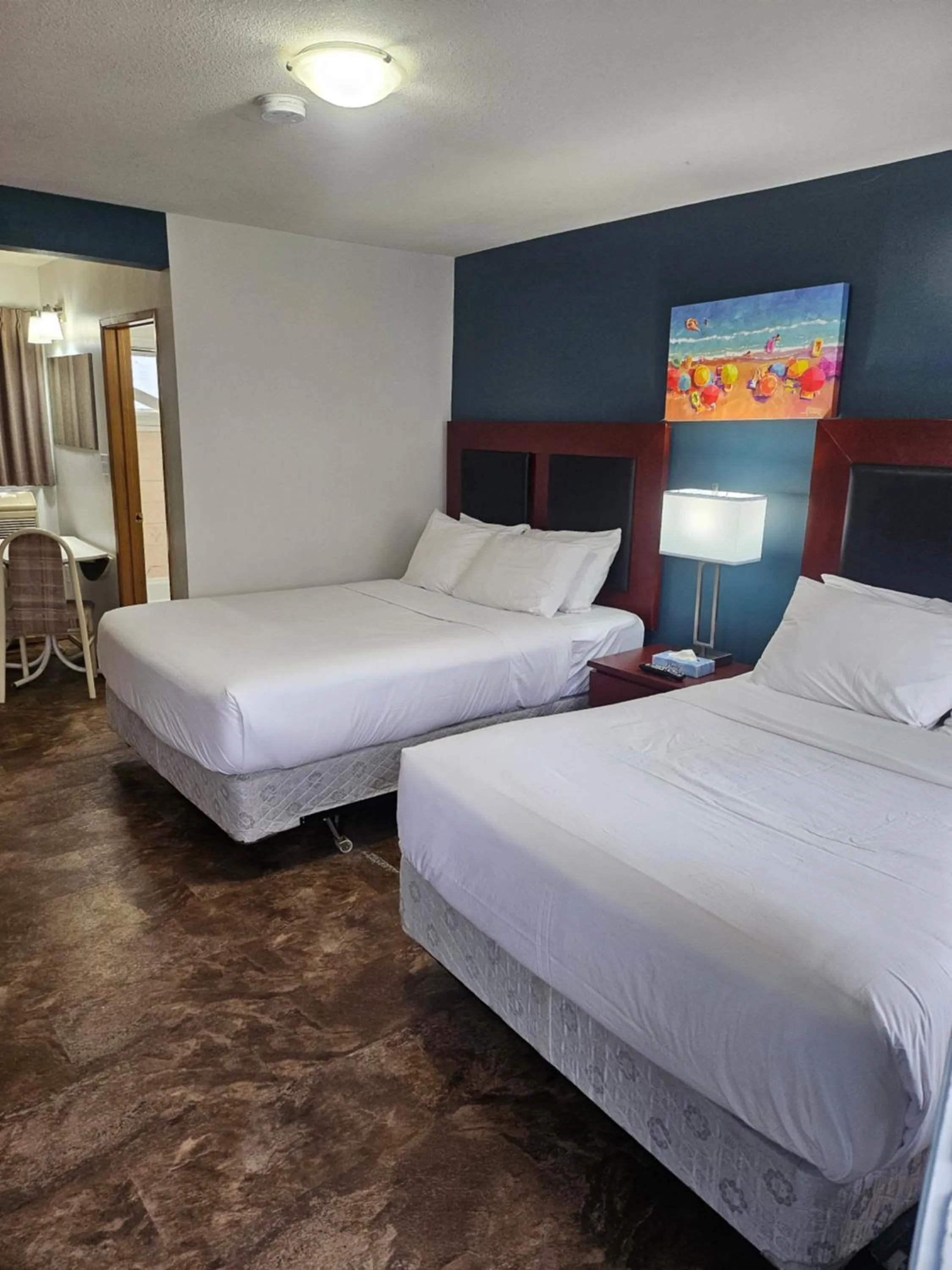 Bed in Shoreline Resort Condominiums