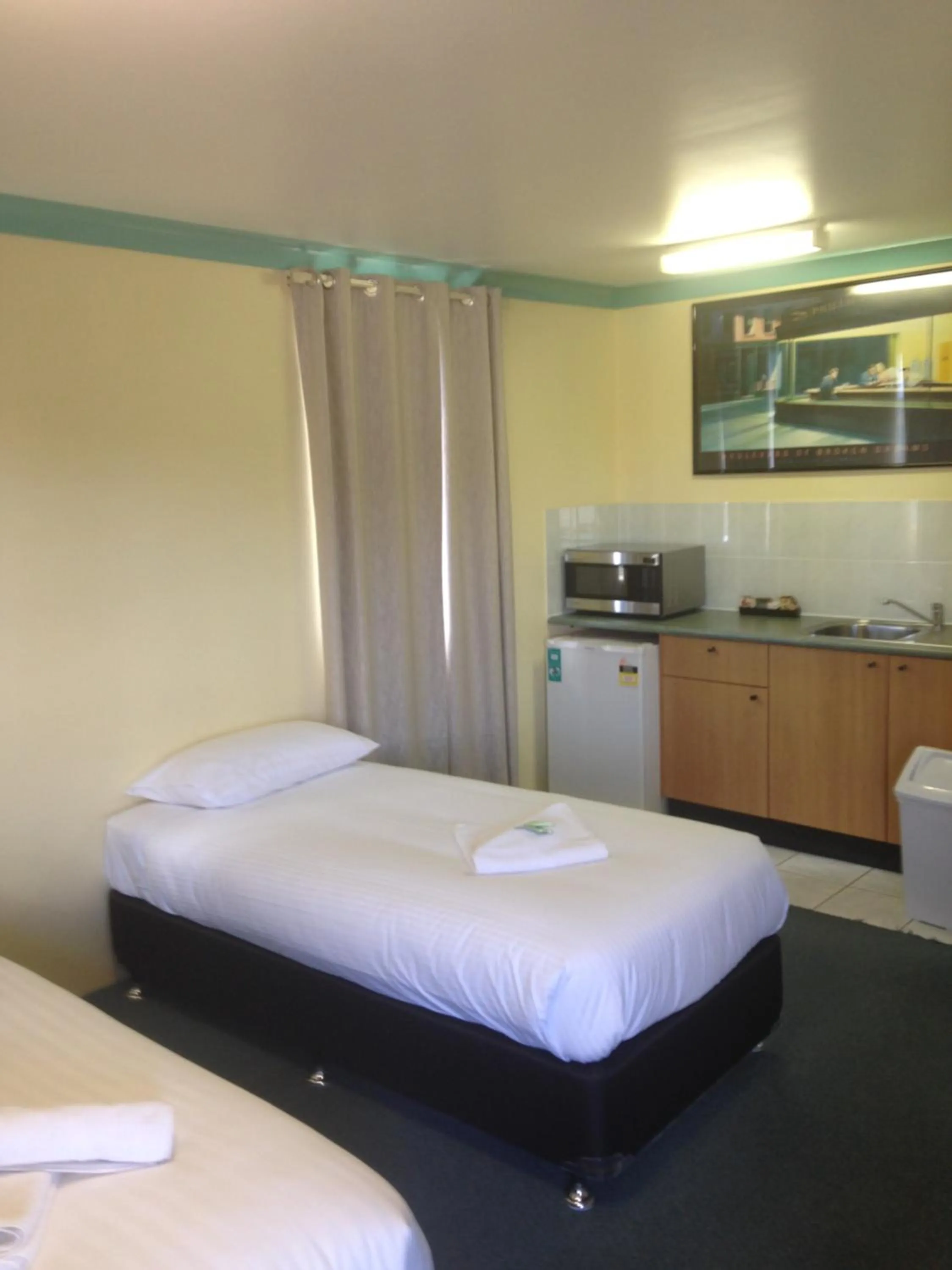 Bed in John Oxley Motel