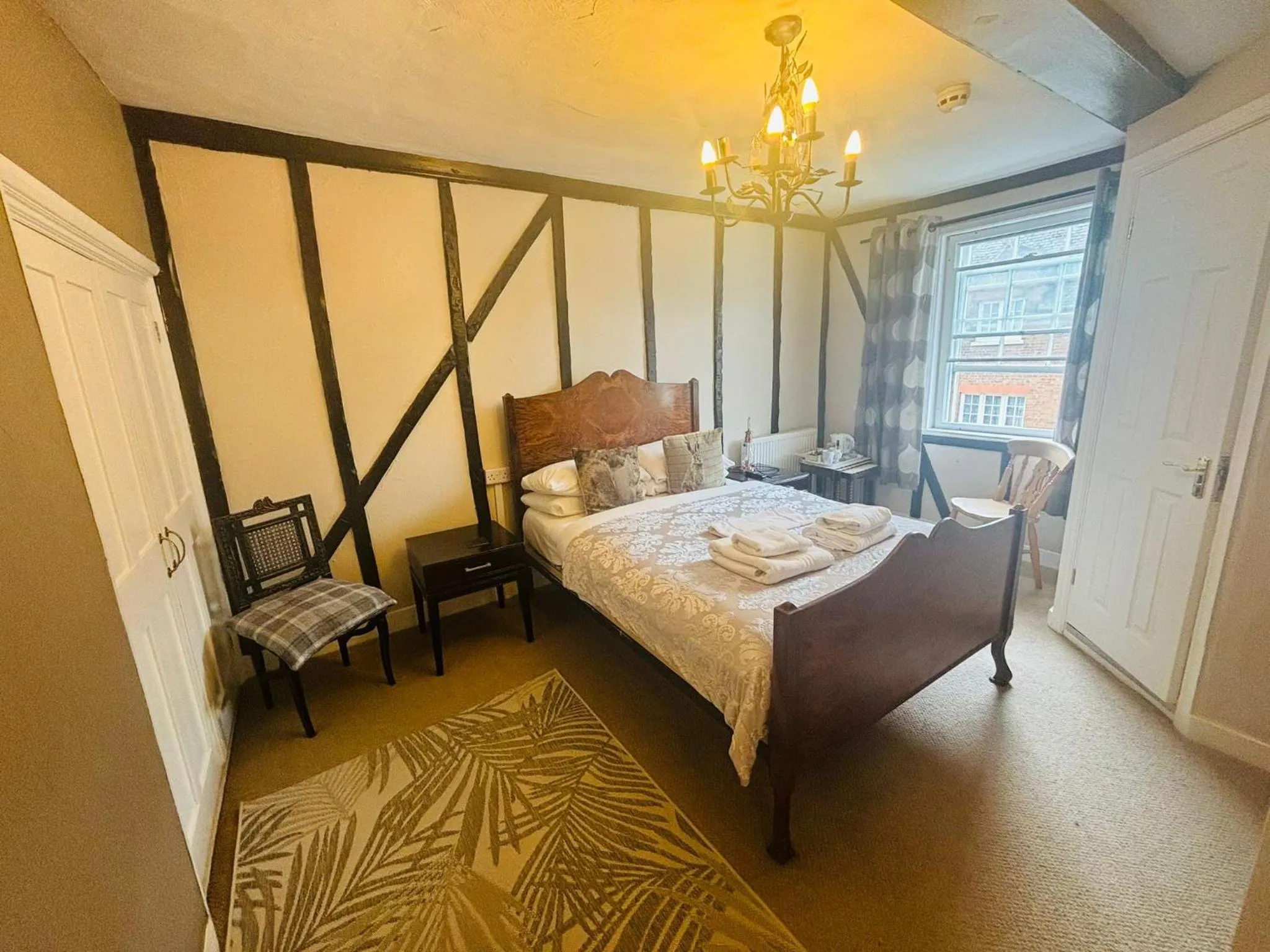 Bed in Longs Hotel & Inn