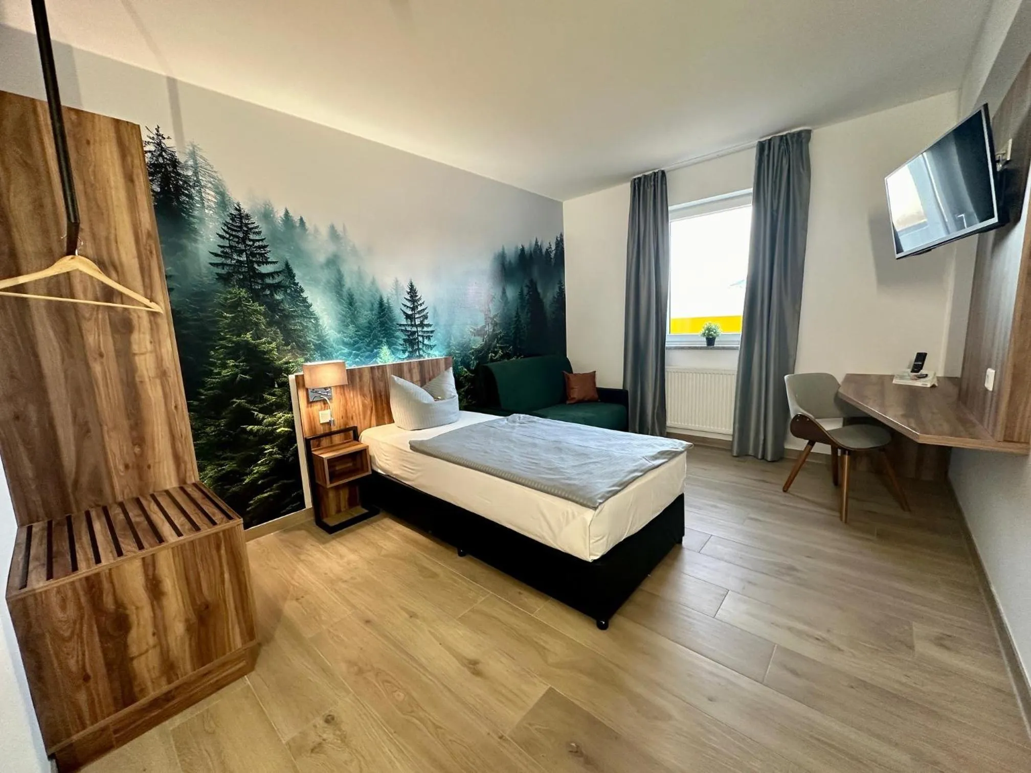 Photo of the whole room, Bed in AUSZEIT DAS HOTEL Asbach-Bäumenheim