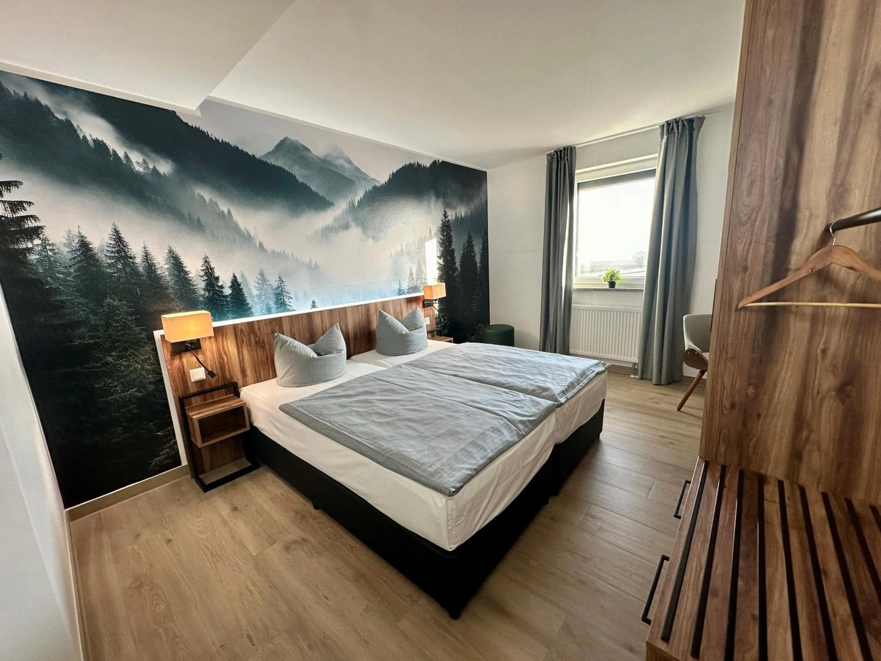 Photo of the whole room, Bed in AUSZEIT DAS HOTEL Asbach-Bäumenheim