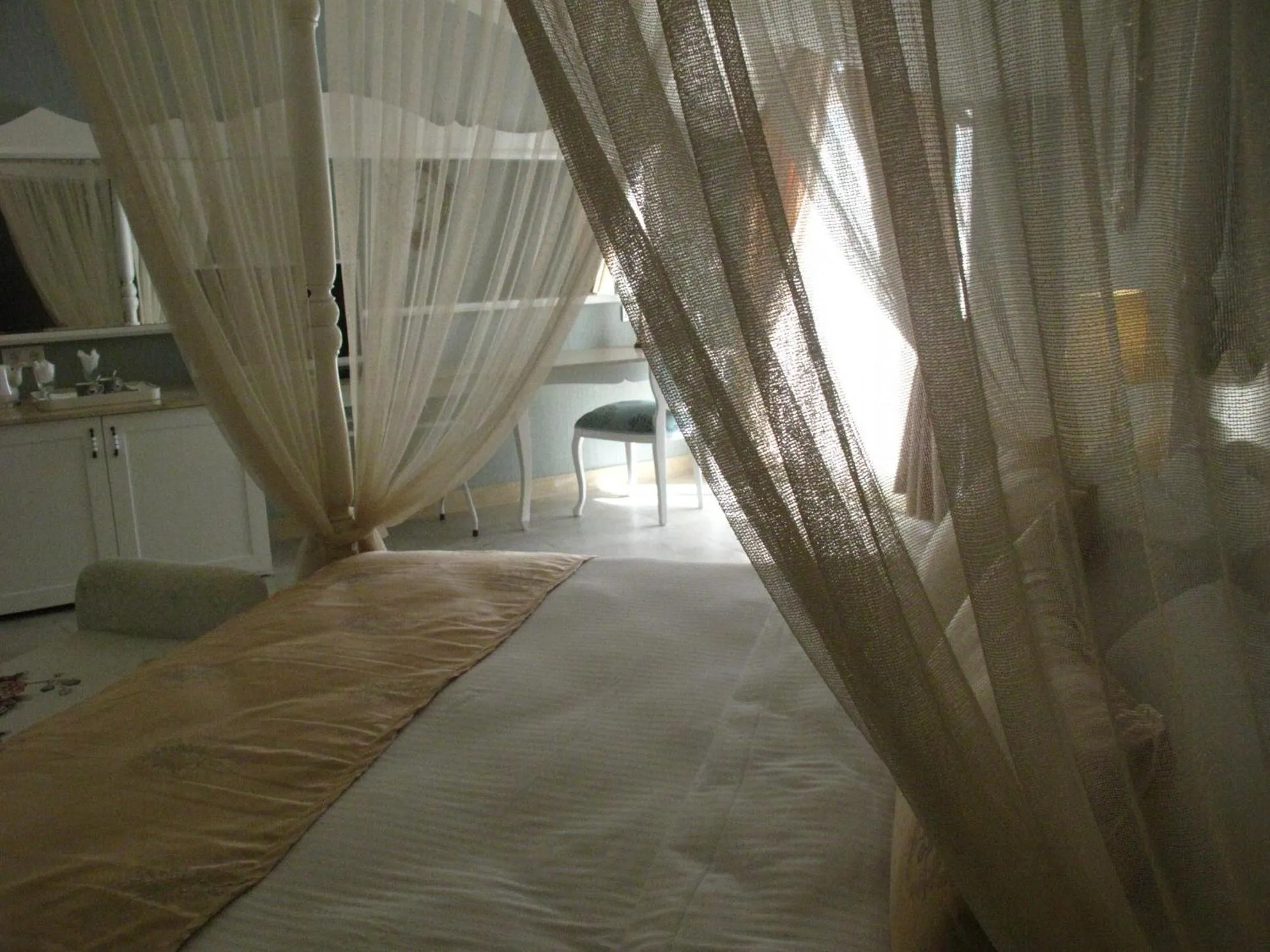 Bed in Sea Breeze Hotel and Apartments