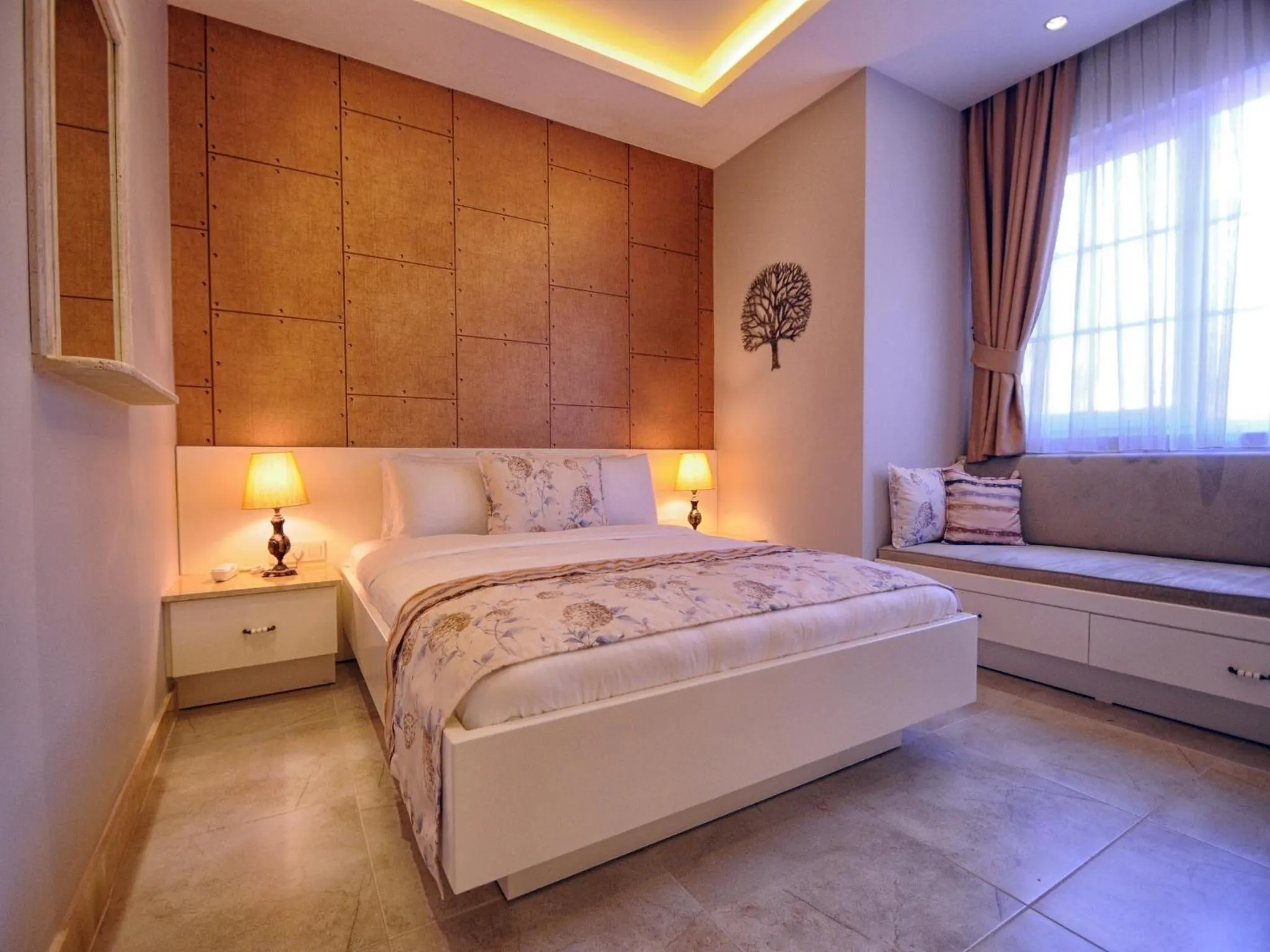 Bed in Sea Breeze Hotel and Apartments