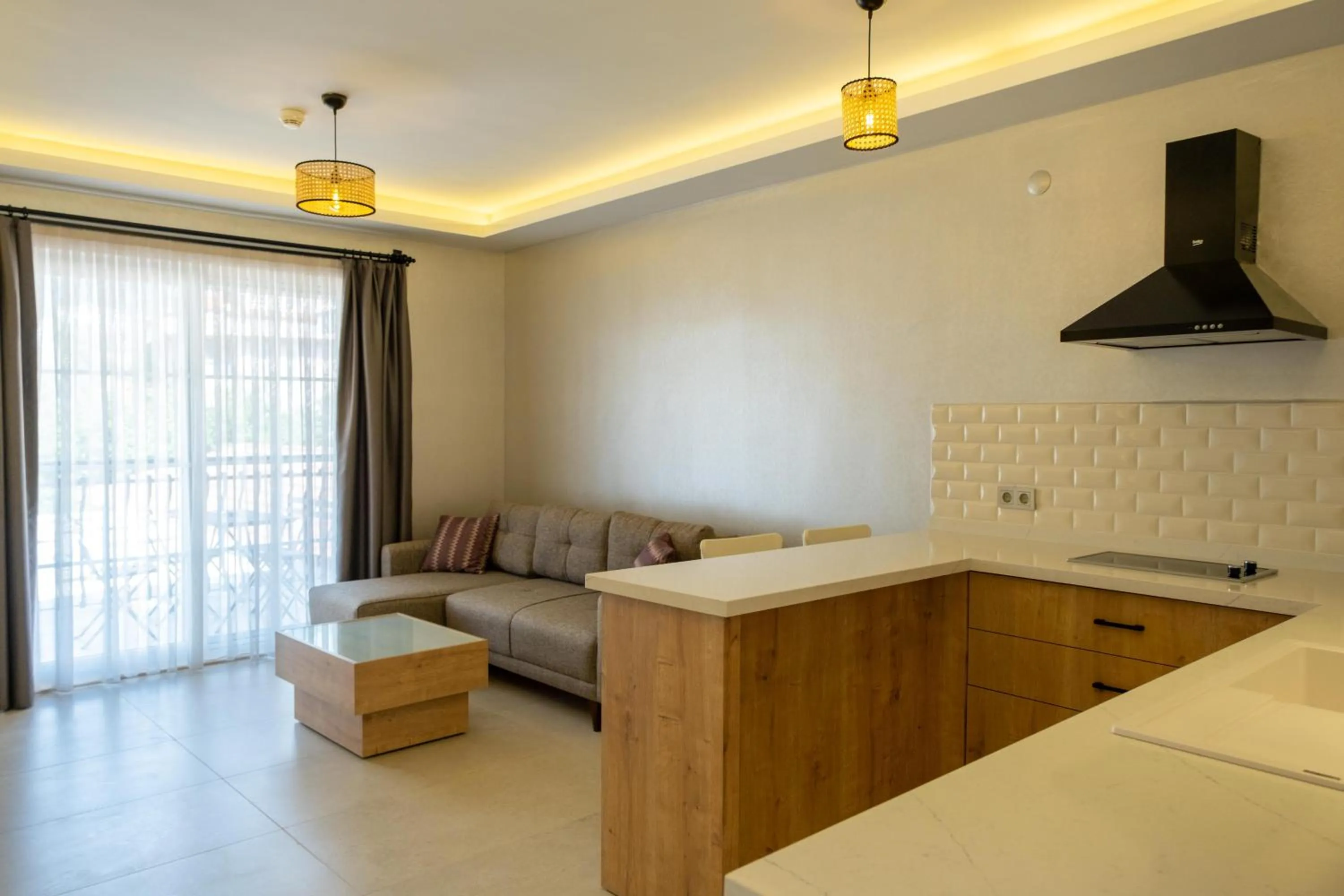 Bed in Sea Breeze Hotel and Apartments