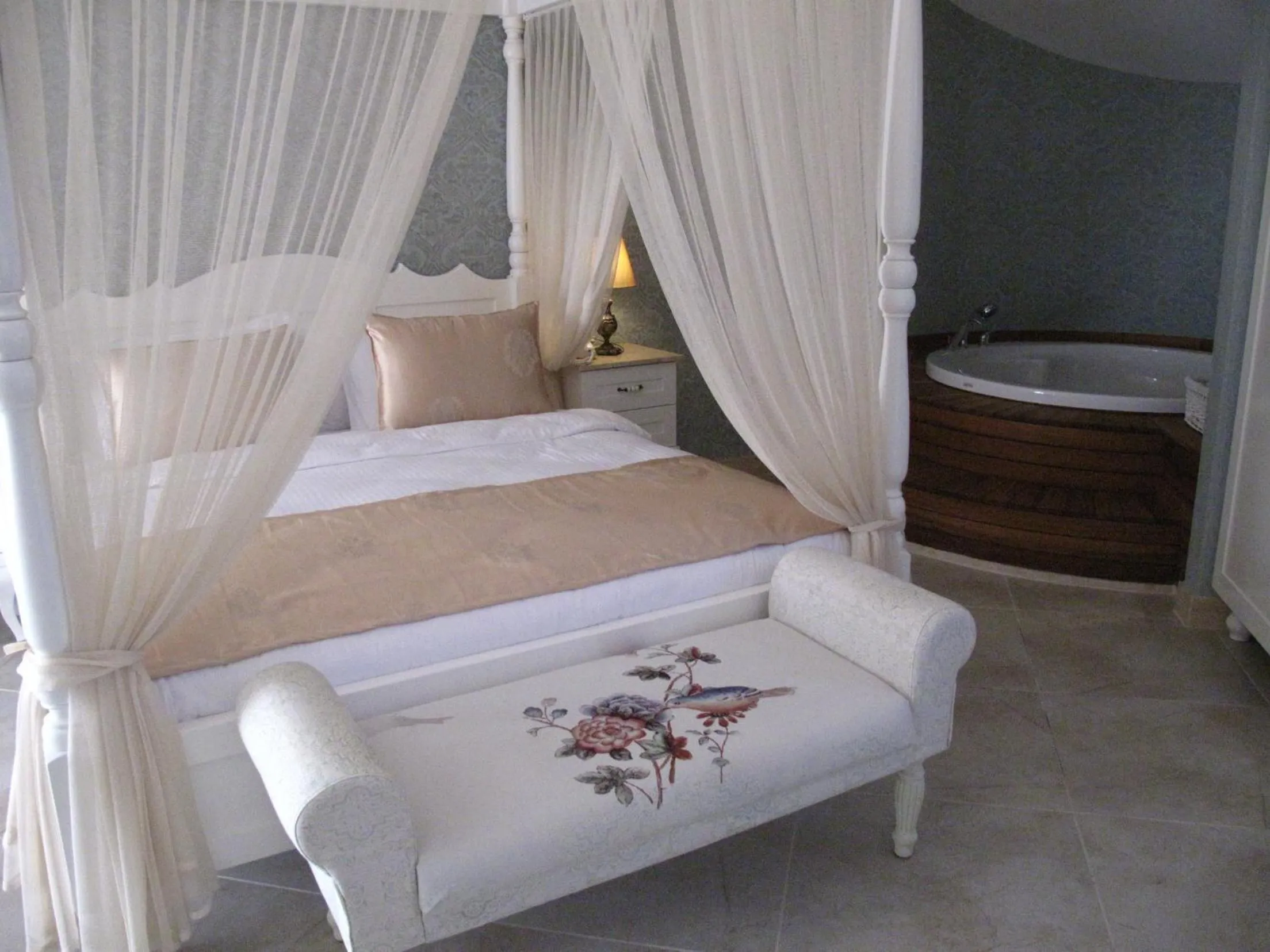 Bed in Sea Breeze Hotel and Apartments