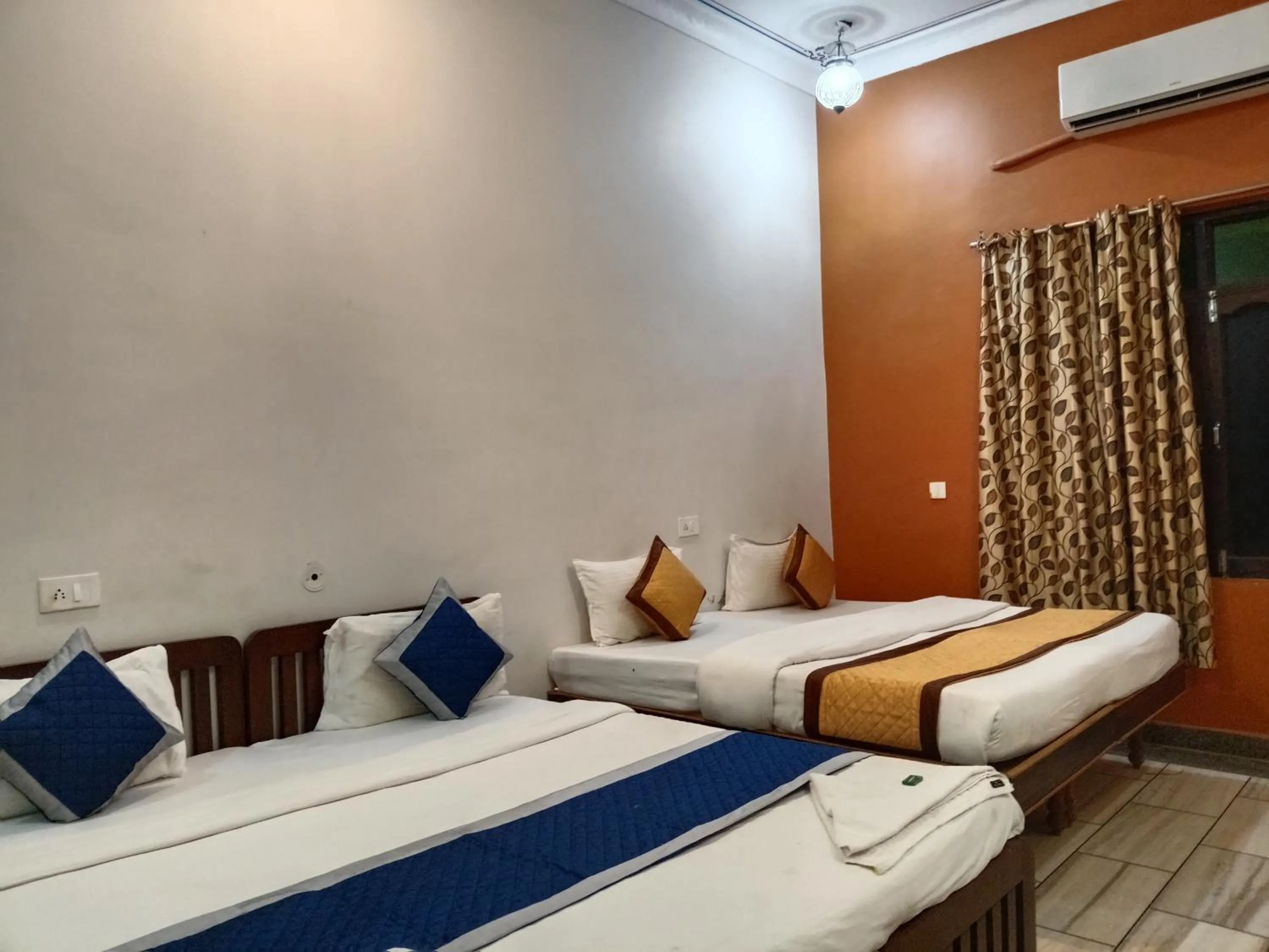 Bed in Hotel Mewad Haveli Pushkar