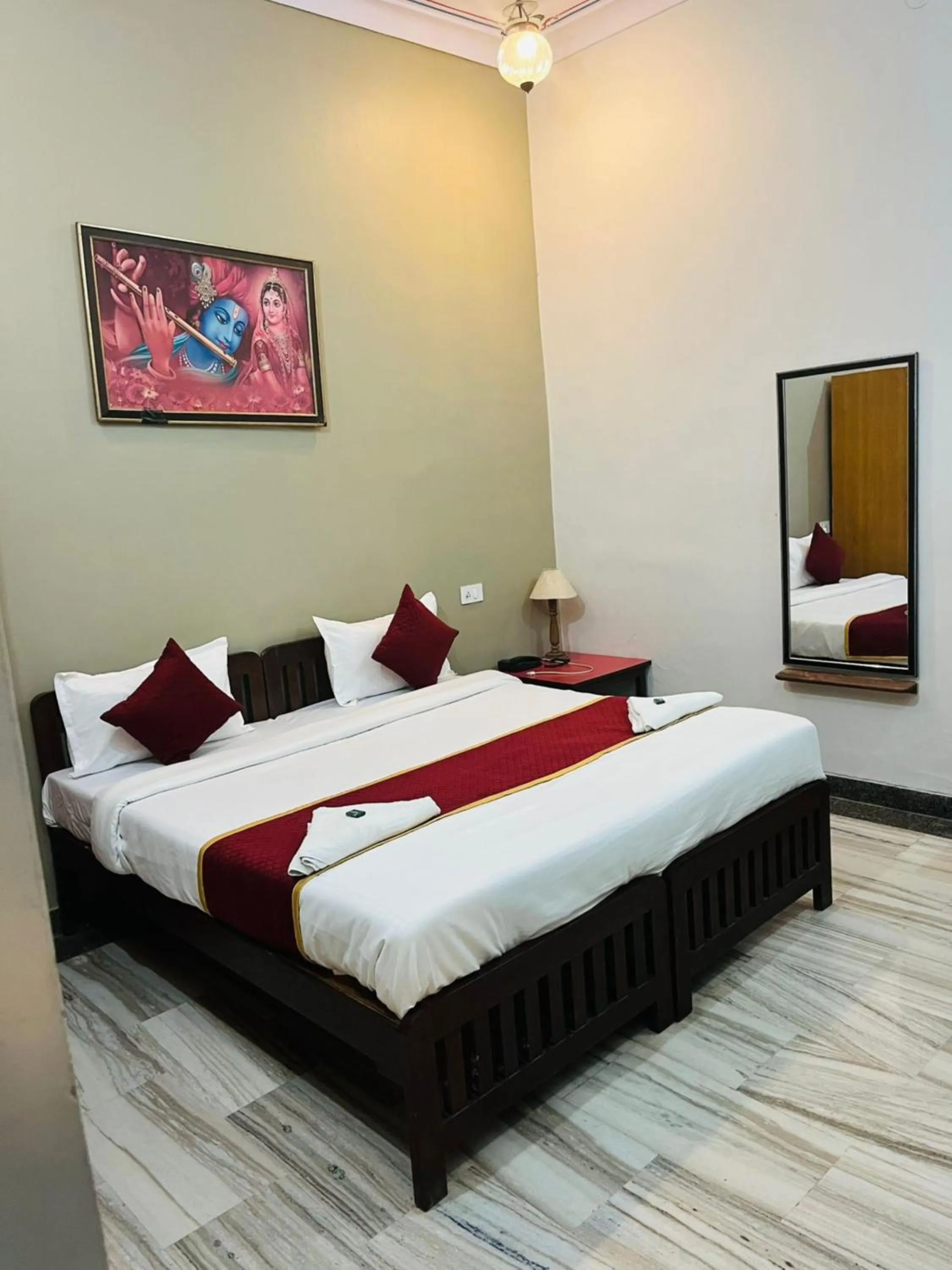 Bed in Hotel Mewad Haveli Pushkar