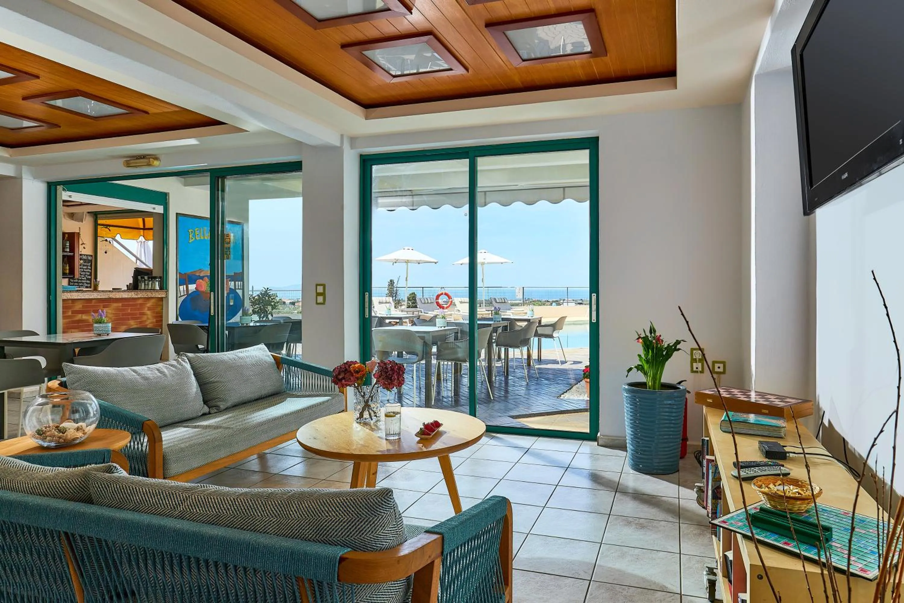 Communal lounge/ TV room in Bella Vista Hotel "by Checkin"