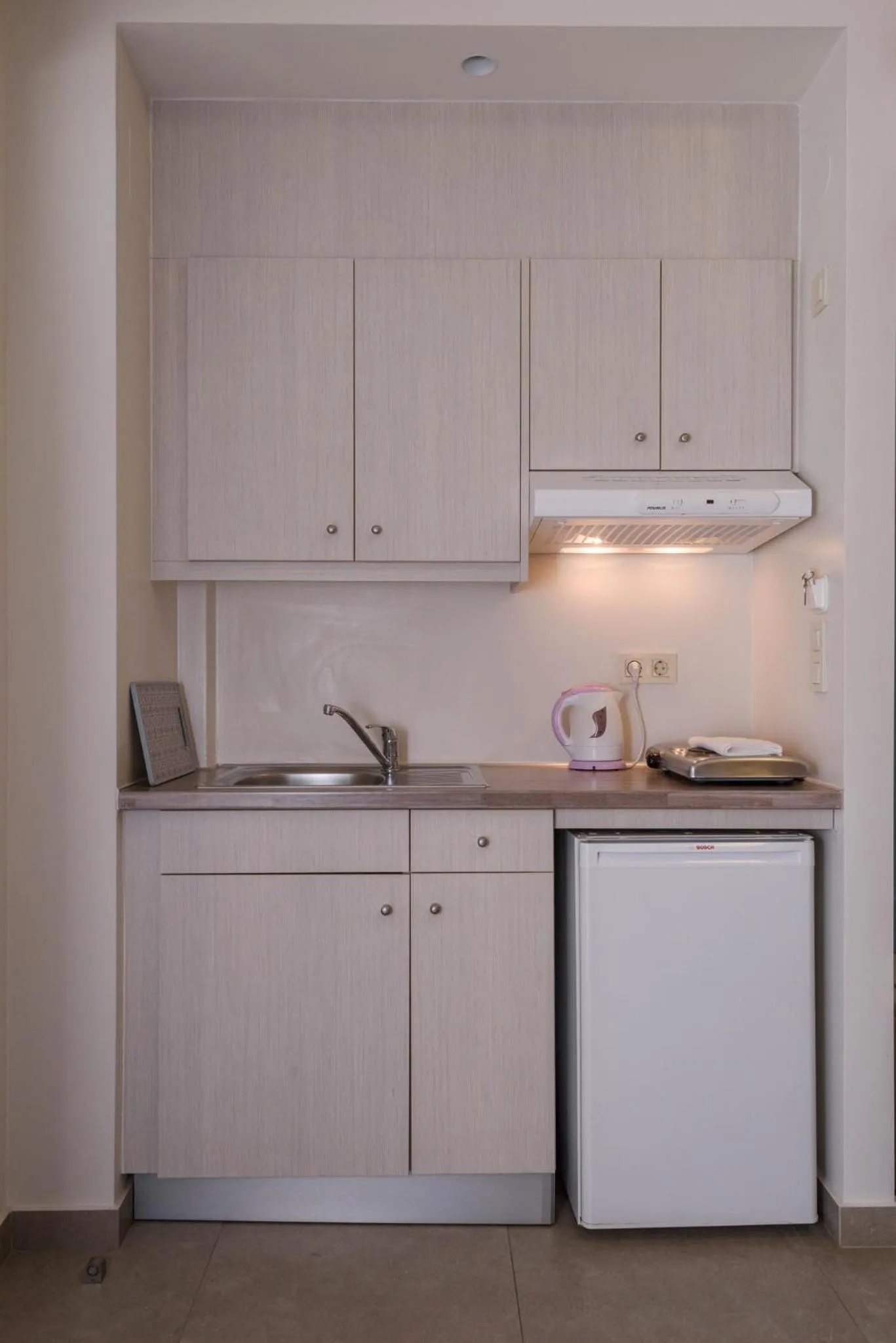 Kitchen or kitchenette in Poseidon Studios & Apartments