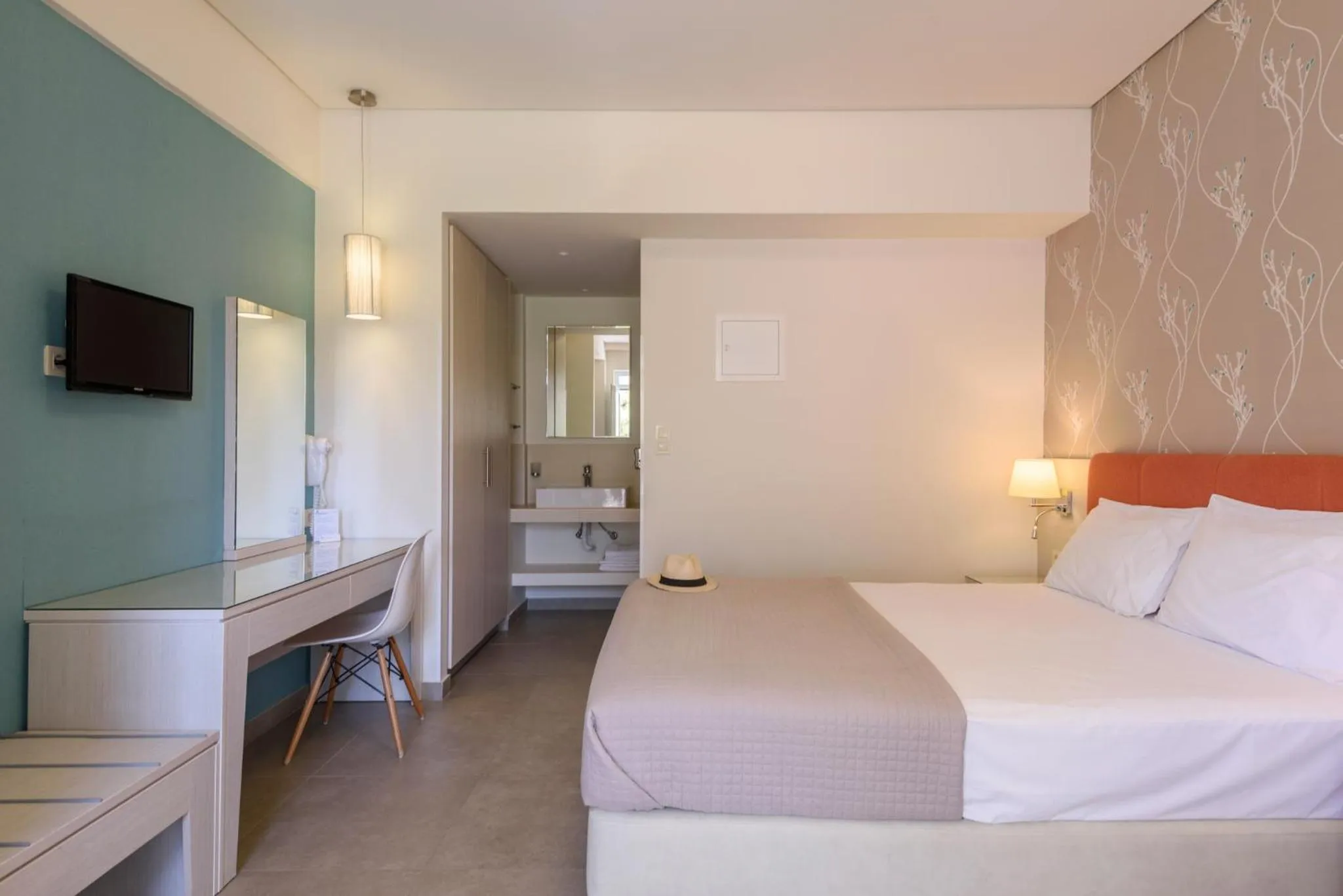 Bed in Poseidon Studios & Apartments