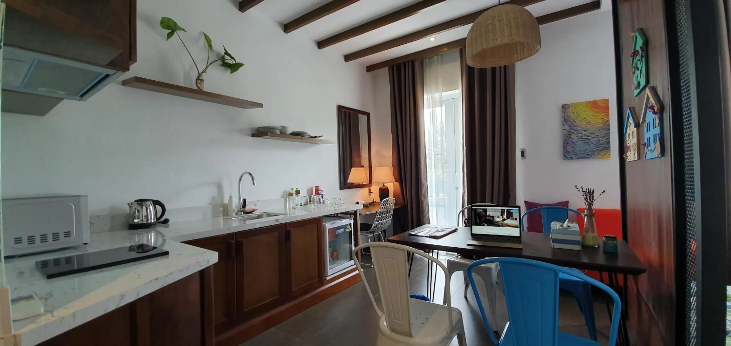 Kitchen or kitchenette in Santori Hotel Da Nang Bay