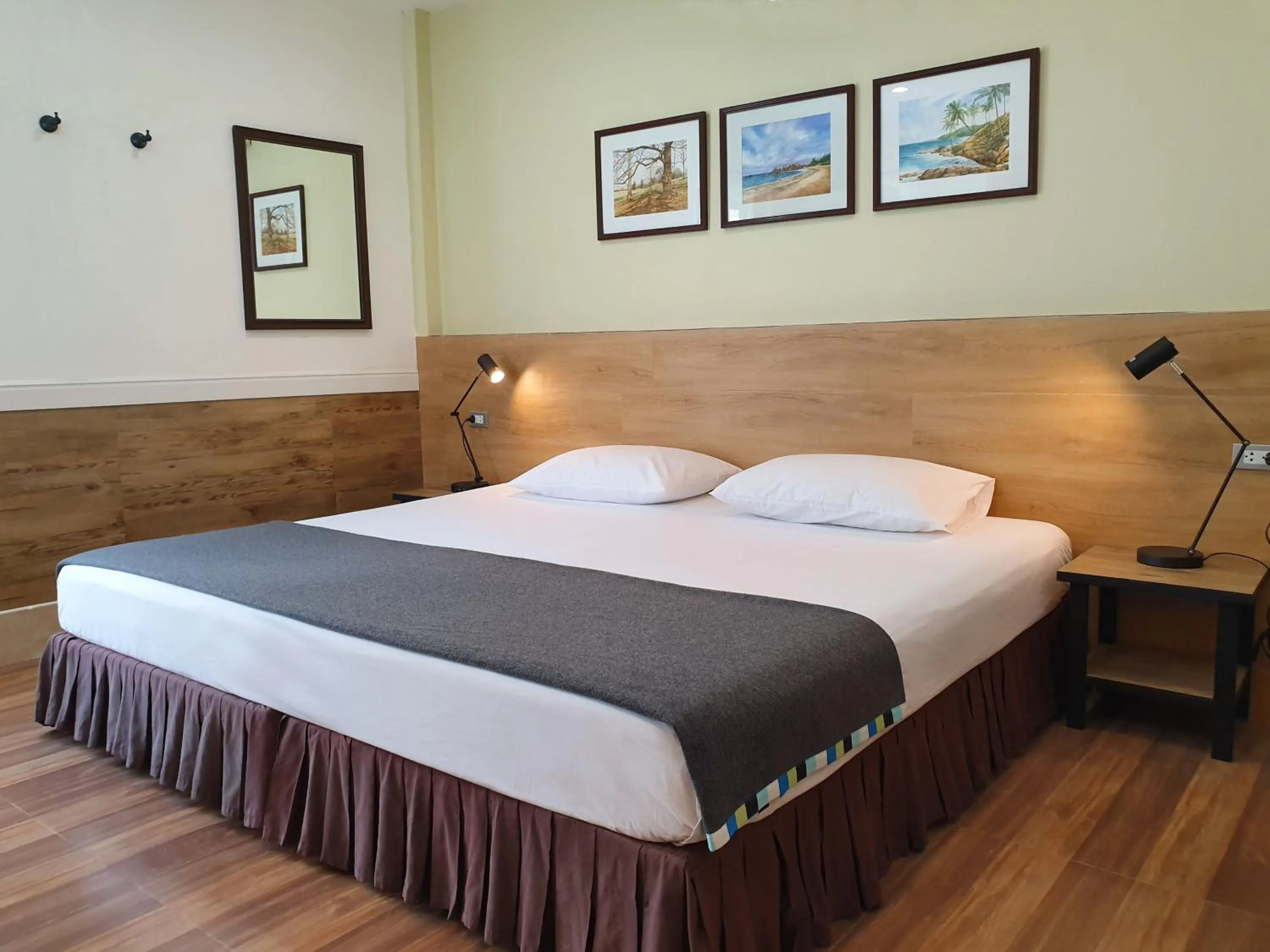 Bed in Holiday Village And Natural Garden Resort