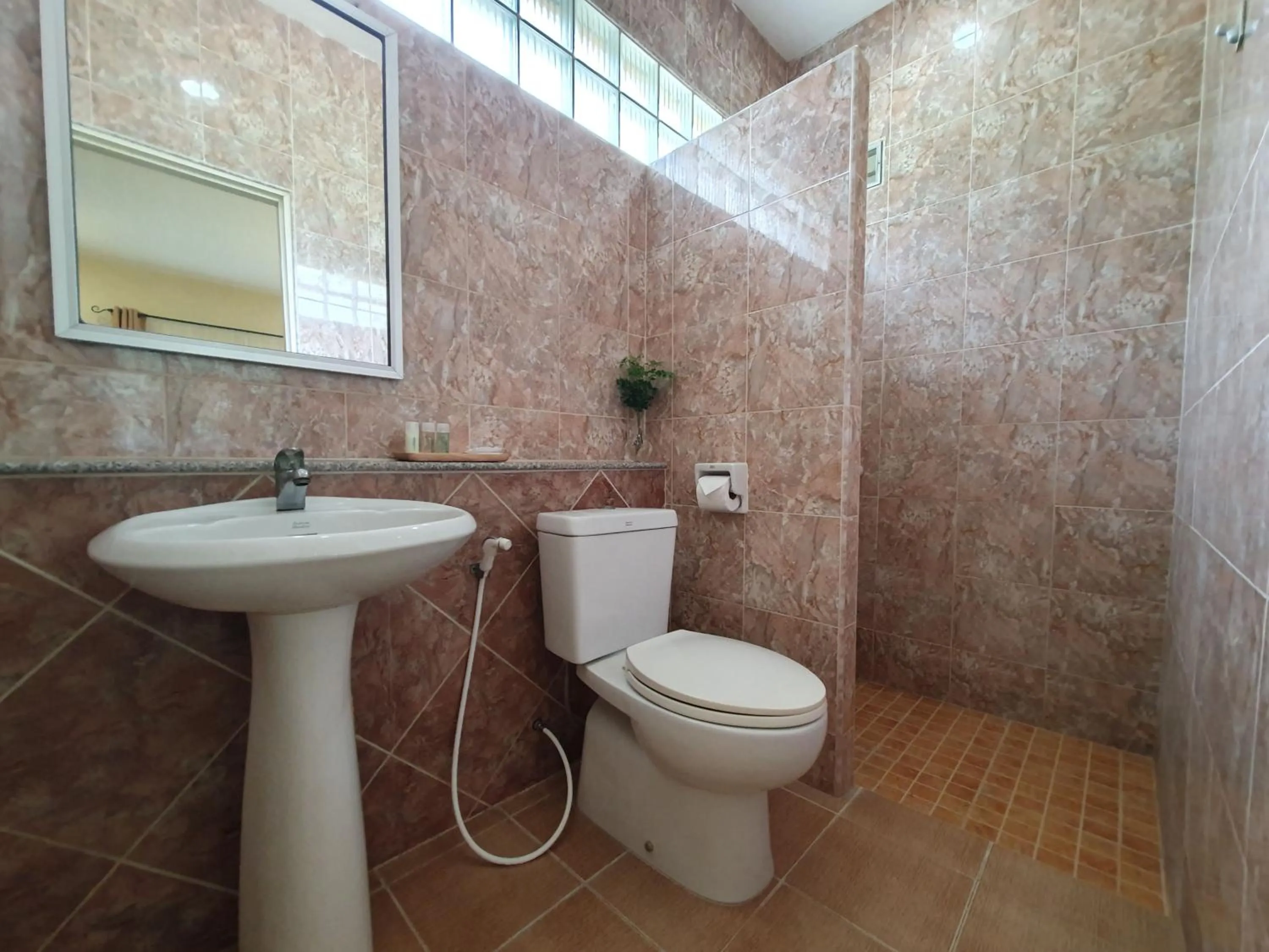 Toilet in Holiday Village And Natural Garden Resort