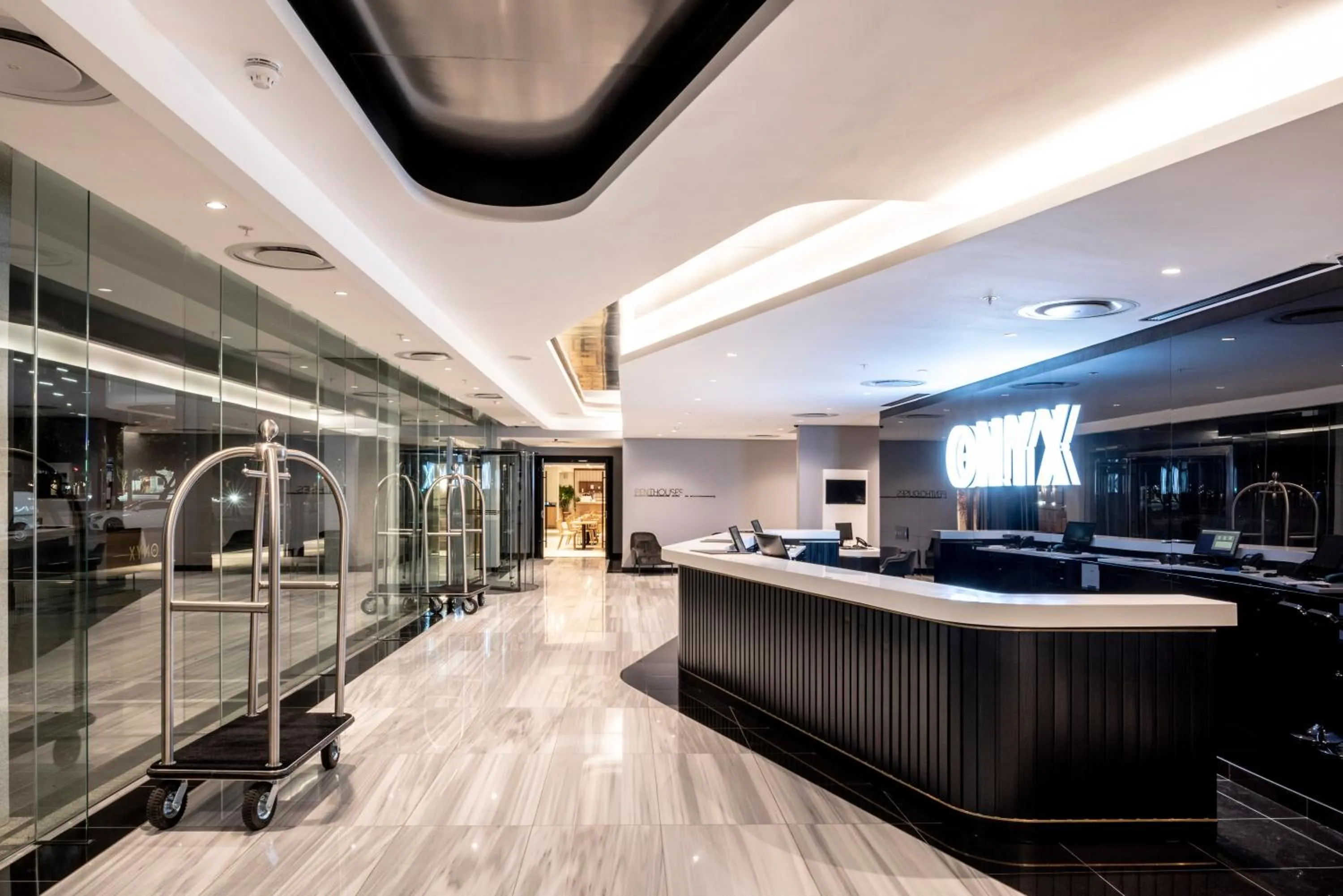 Lobby or reception in The Onyx Apartment Hotel by NEWMARK