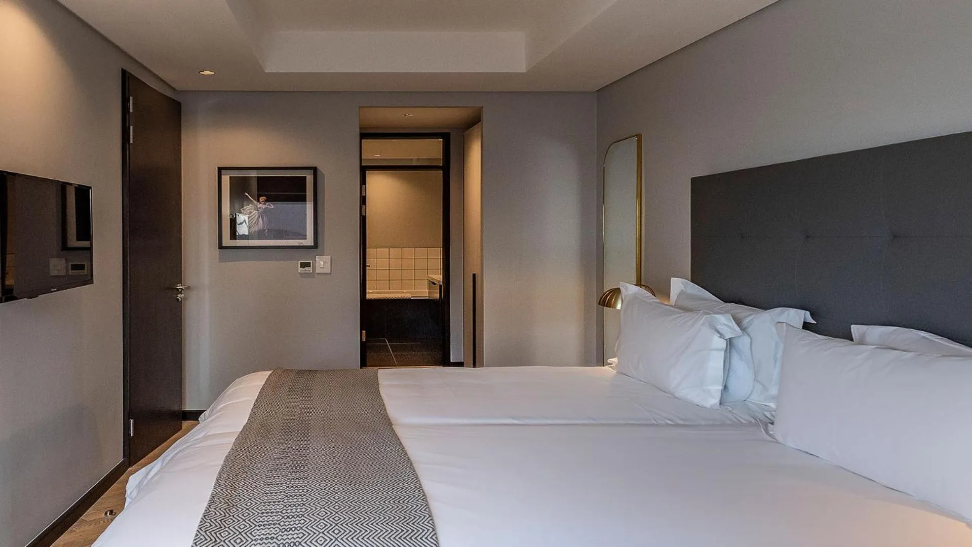 Bed in The Onyx Apartment Hotel by NEWMARK